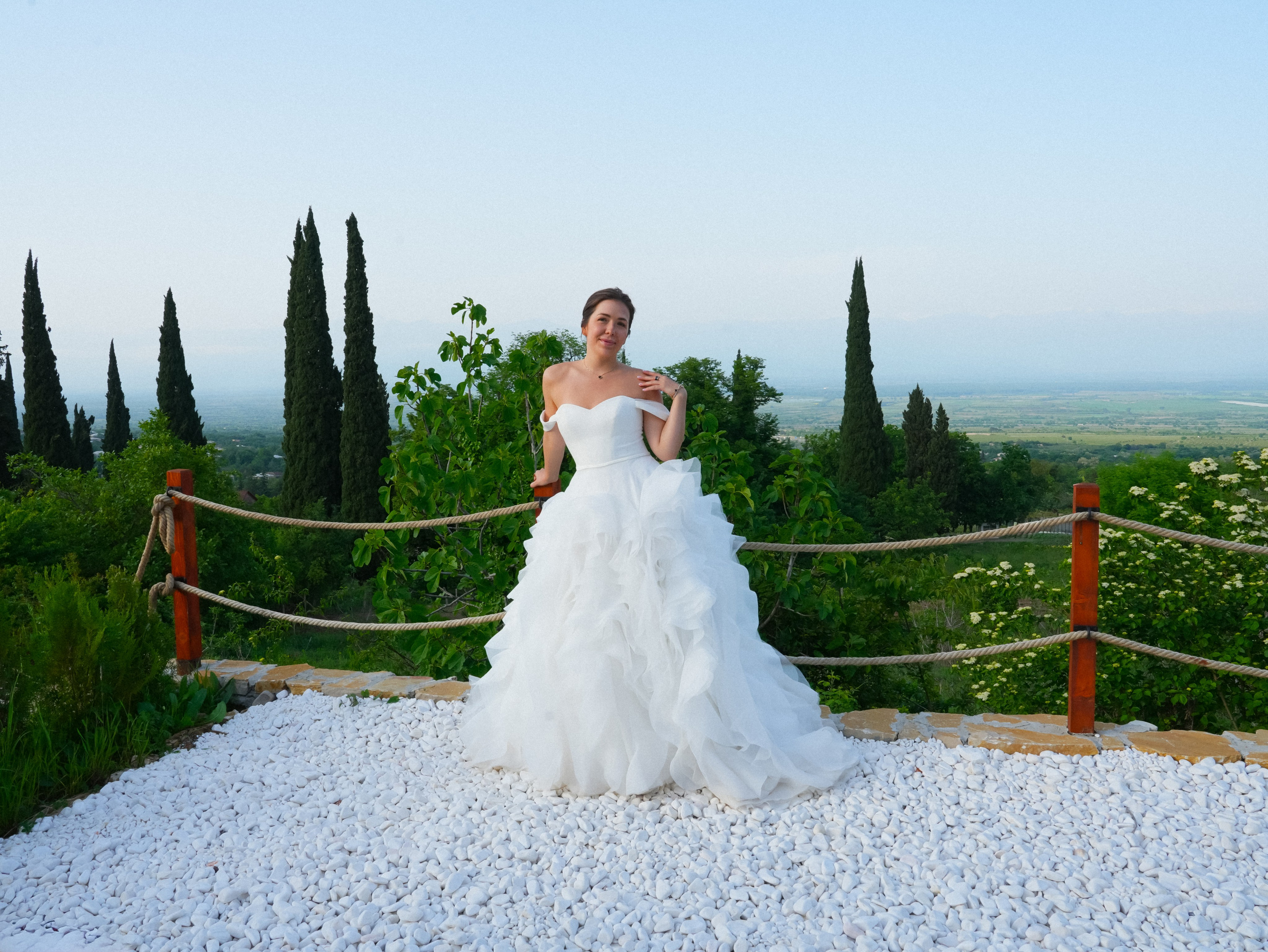 Bride overlooking Kakheti valley landscape