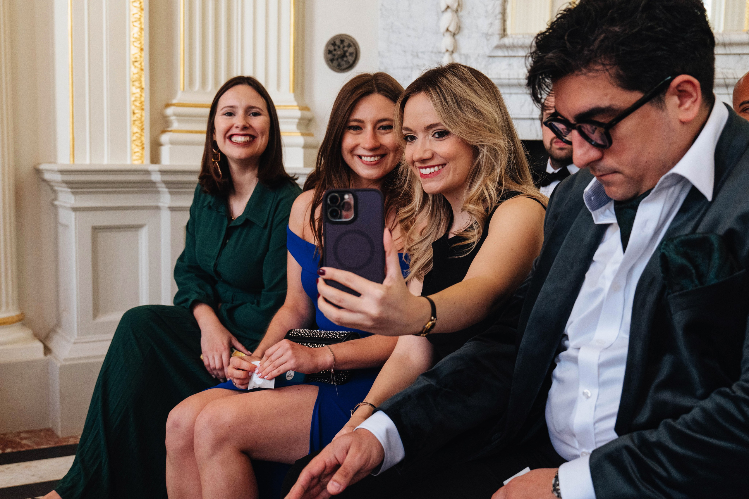 guests at the wedding making photos