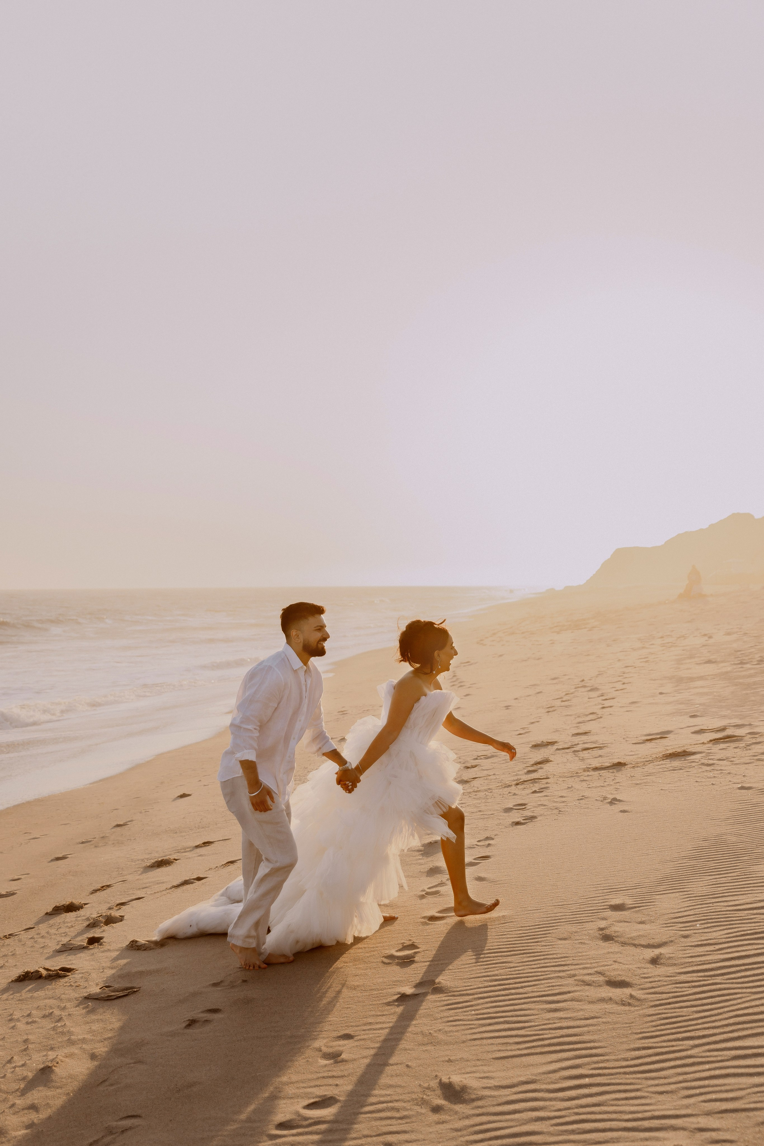 Engagement Photoshoot at Malibu Beach | Taya Frank. Southern California Family and Couple Photographer