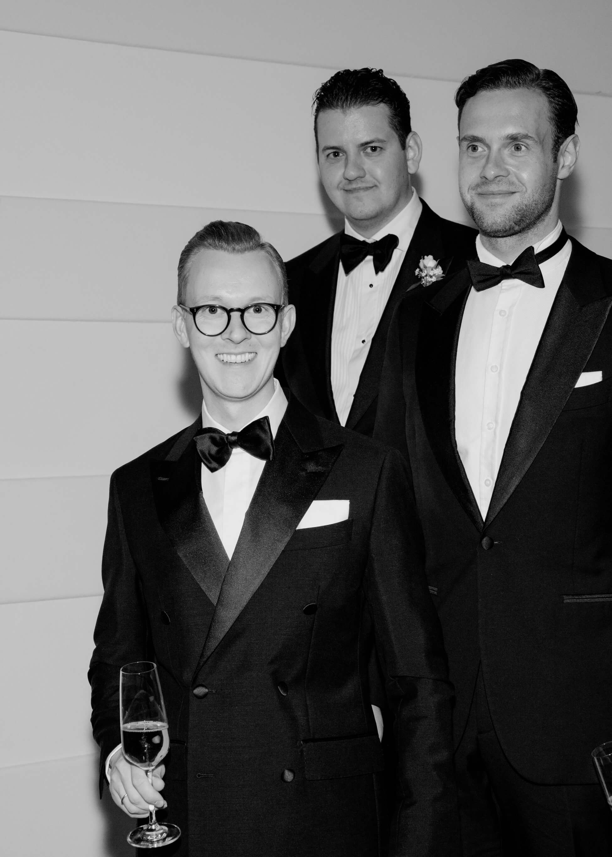 Groom with groomsman in black tuxedos at luxury wedding, Villa Rothschild Frankfurt