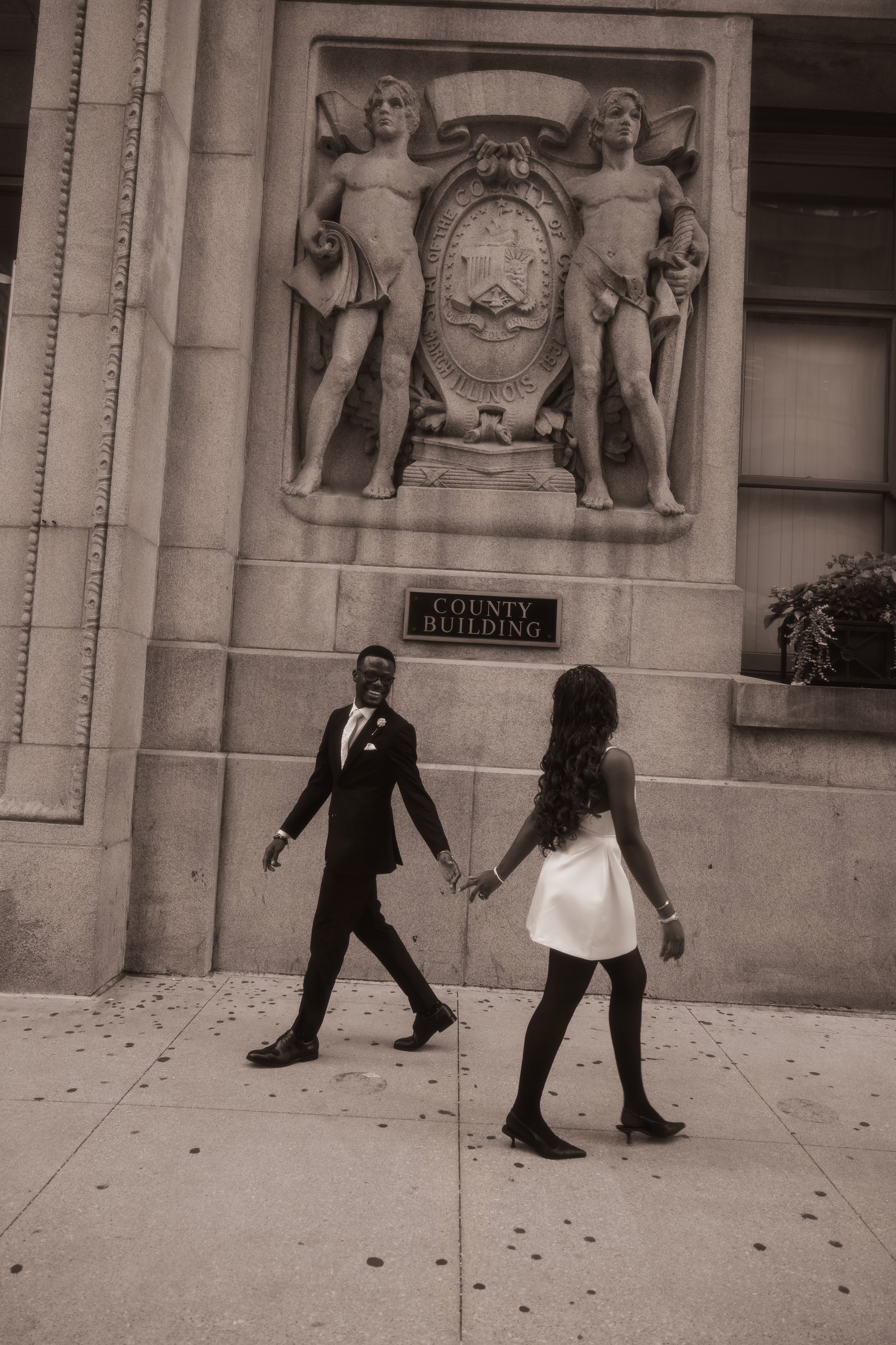 Bride and groom sharing a kiss after their Chicago City Hall wedding.