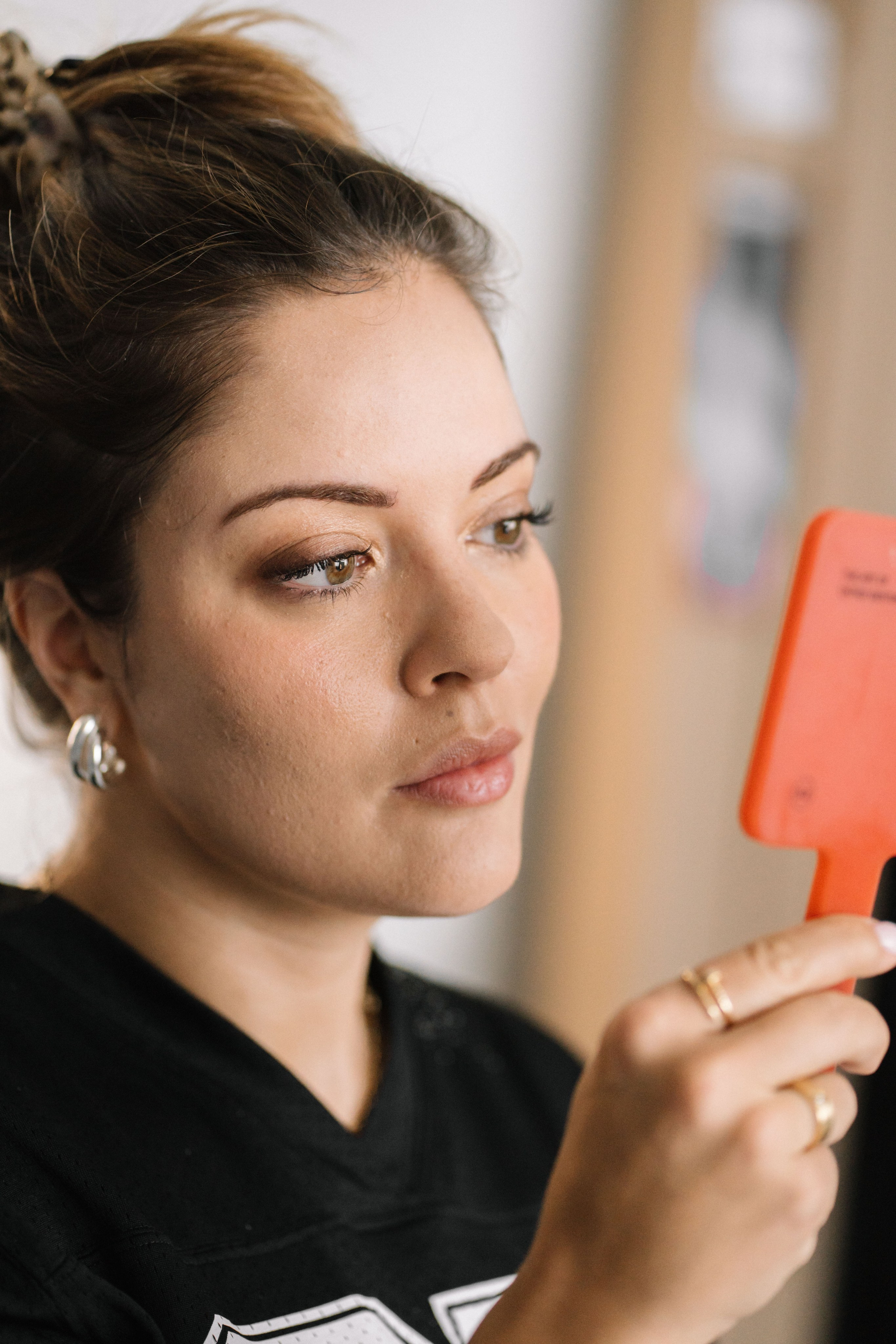Natural makeup styling for authentic business portraits at luxury headshot studio in Burnaby