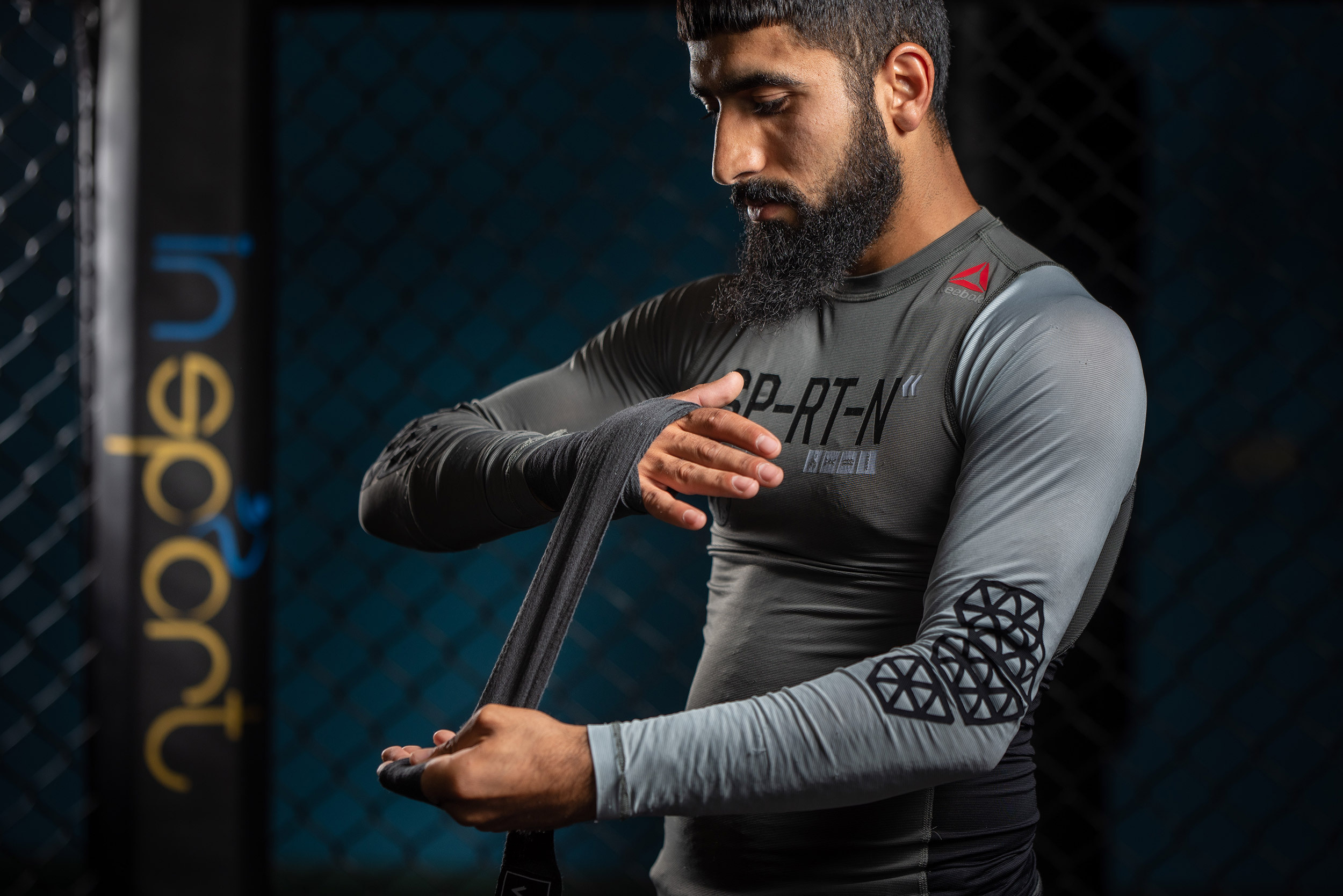 Athlete in sportswear, combat-ready stance