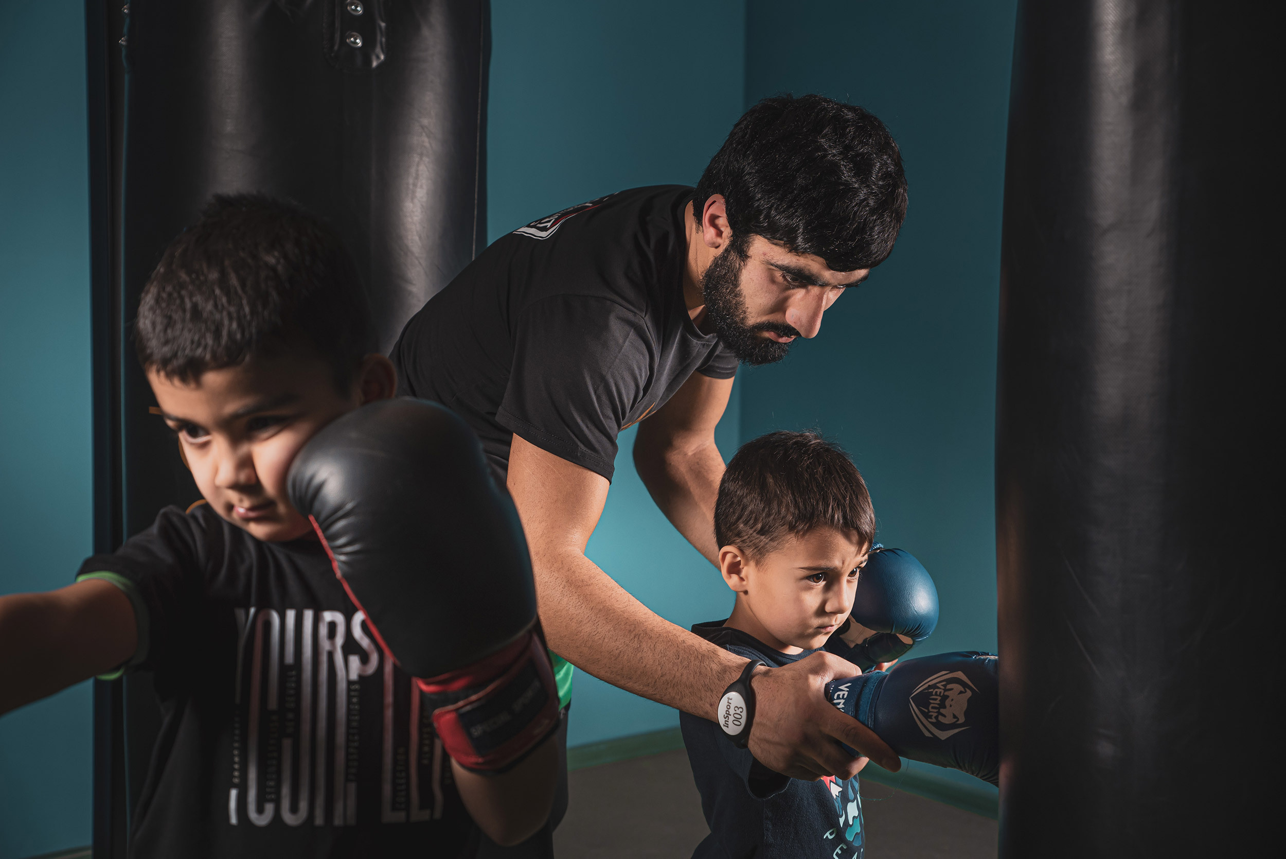 Young athlete during boxing training