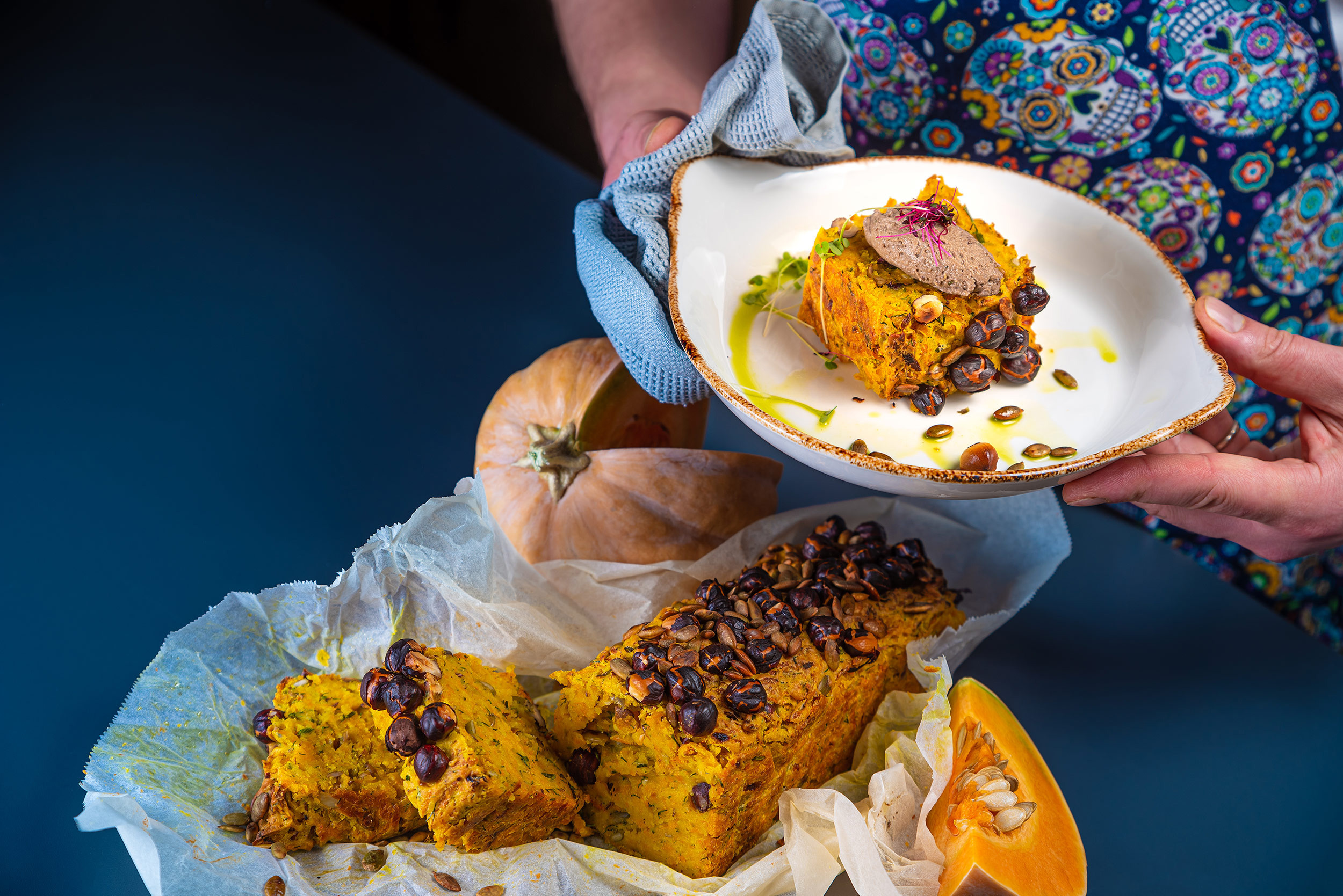 Warm vegetable bread with nuts, served on a plate