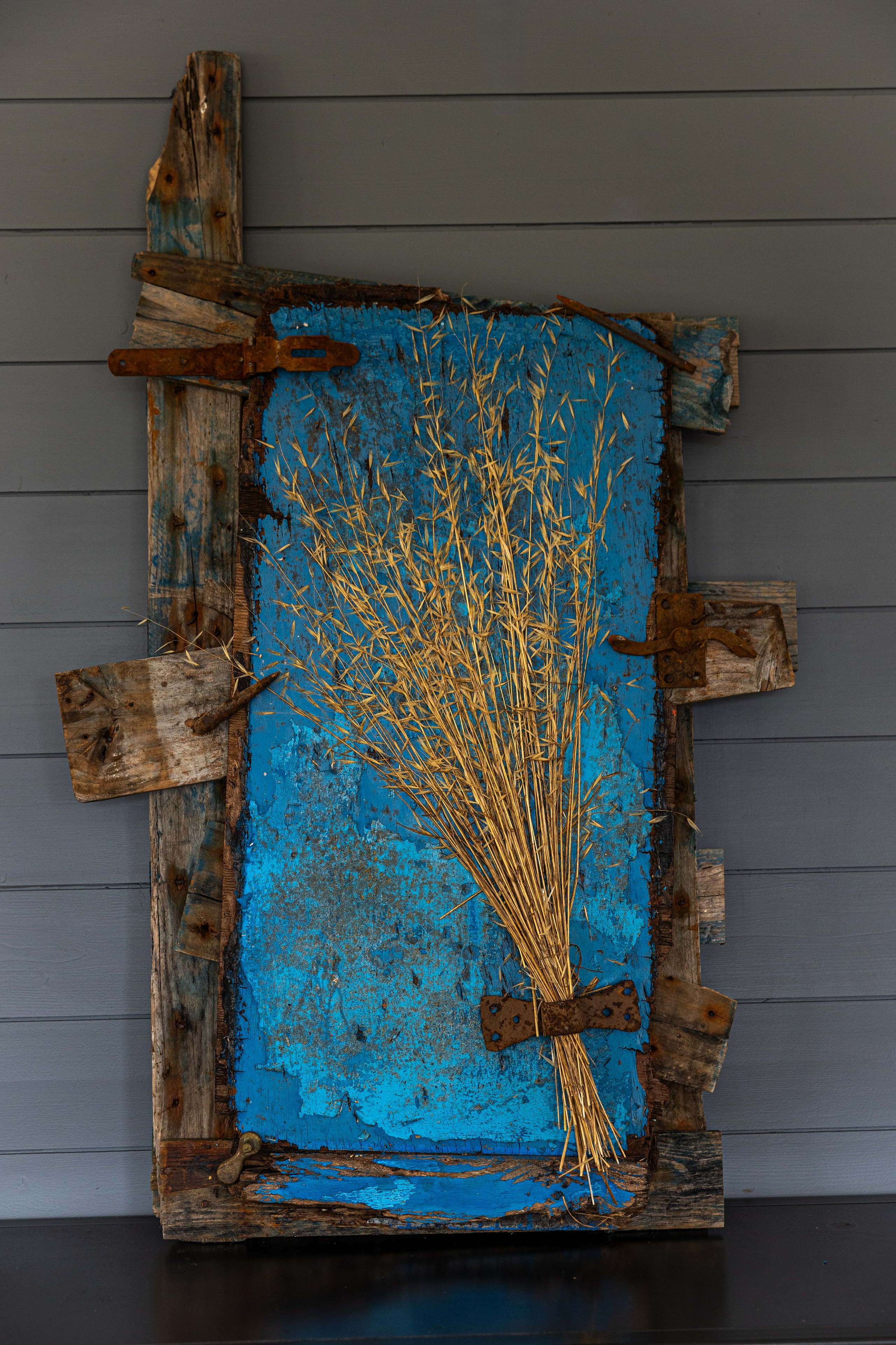 Fresh wheat from a french land on a piece of boat 