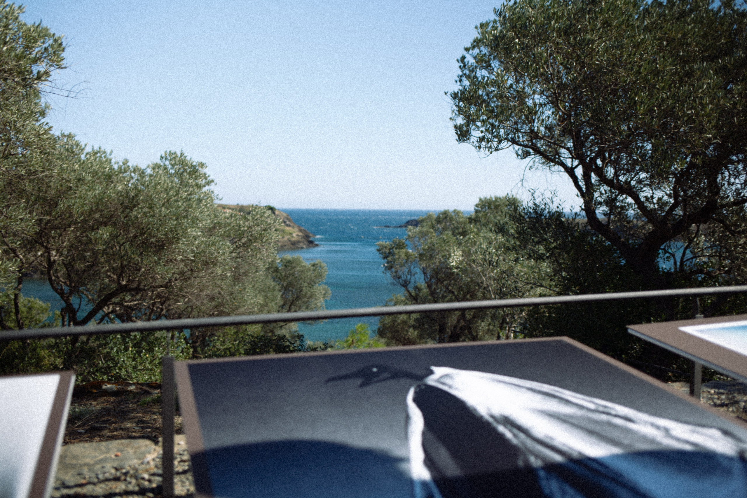 Art, sunlight, and quiet presence at InCadaqués Photo Festival.