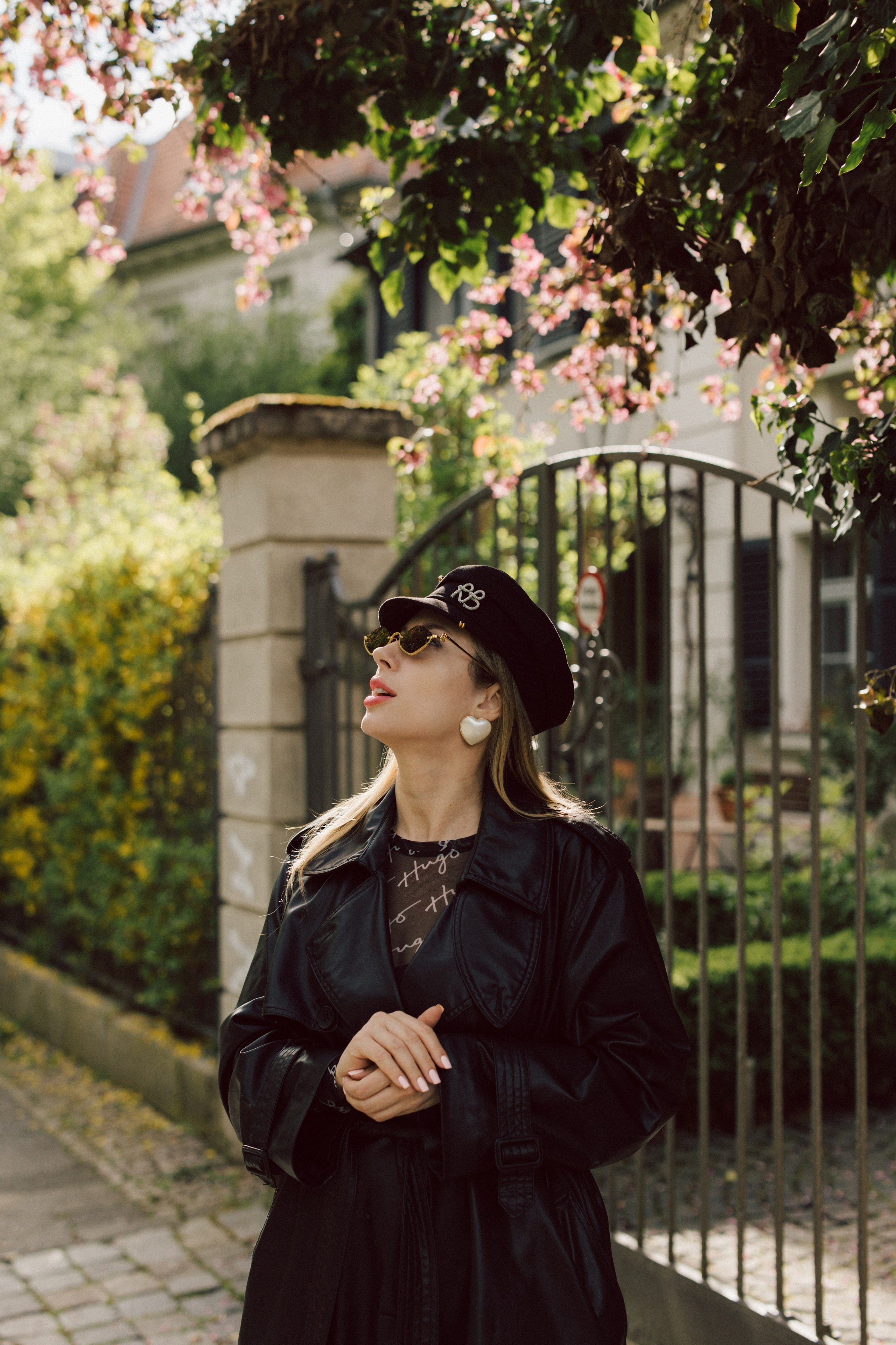 Street Portrait in Leipzig. Woman in black Leather Coat. Stylish. Charismatic Photography by Kristina Kozheltsova. Kristina Kozheltsova- Soulful Portrait&Lifestyle&Love Story Photographer in Leipzig, Germany