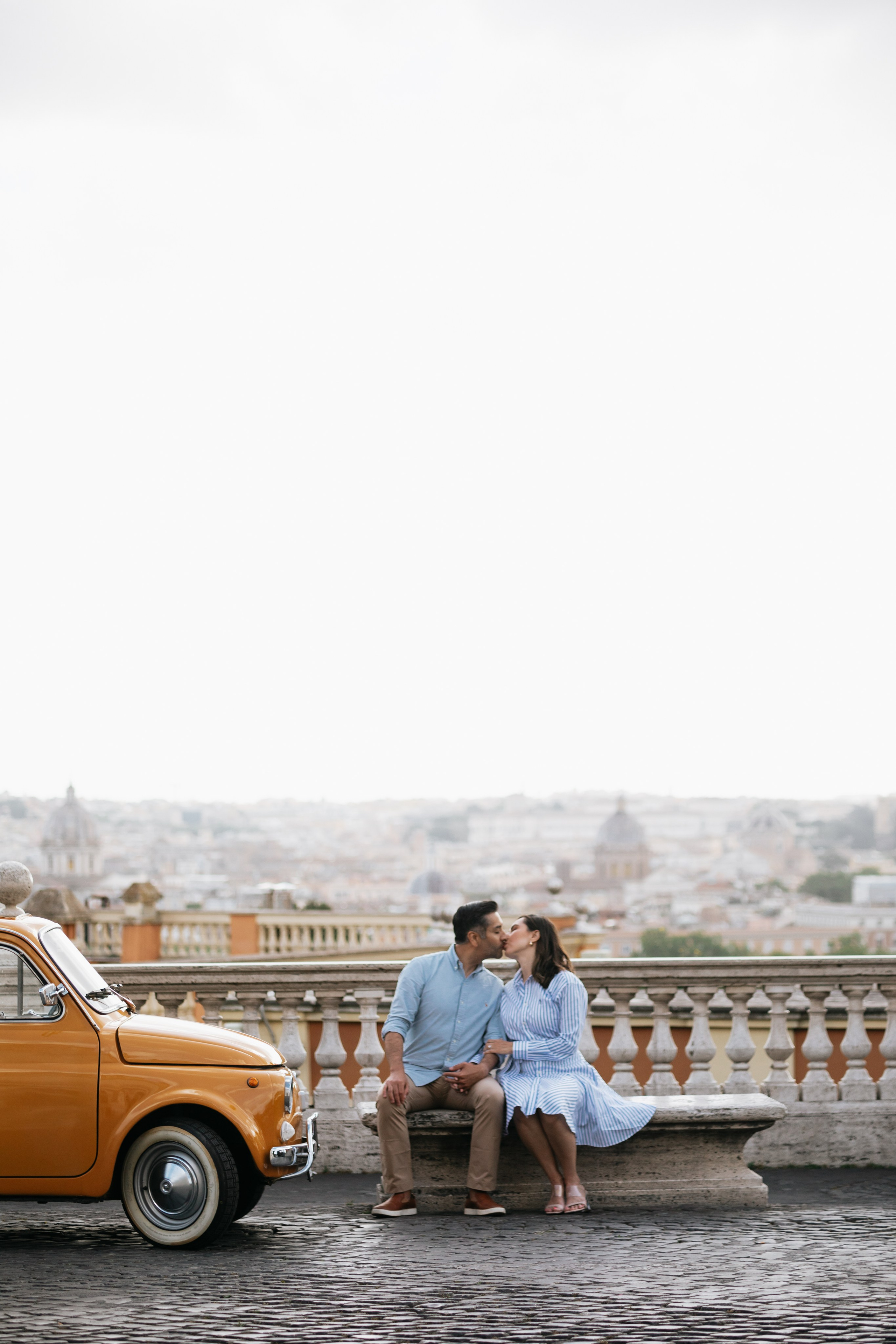 Fiat 500 and Vespa. Photographer in Rome