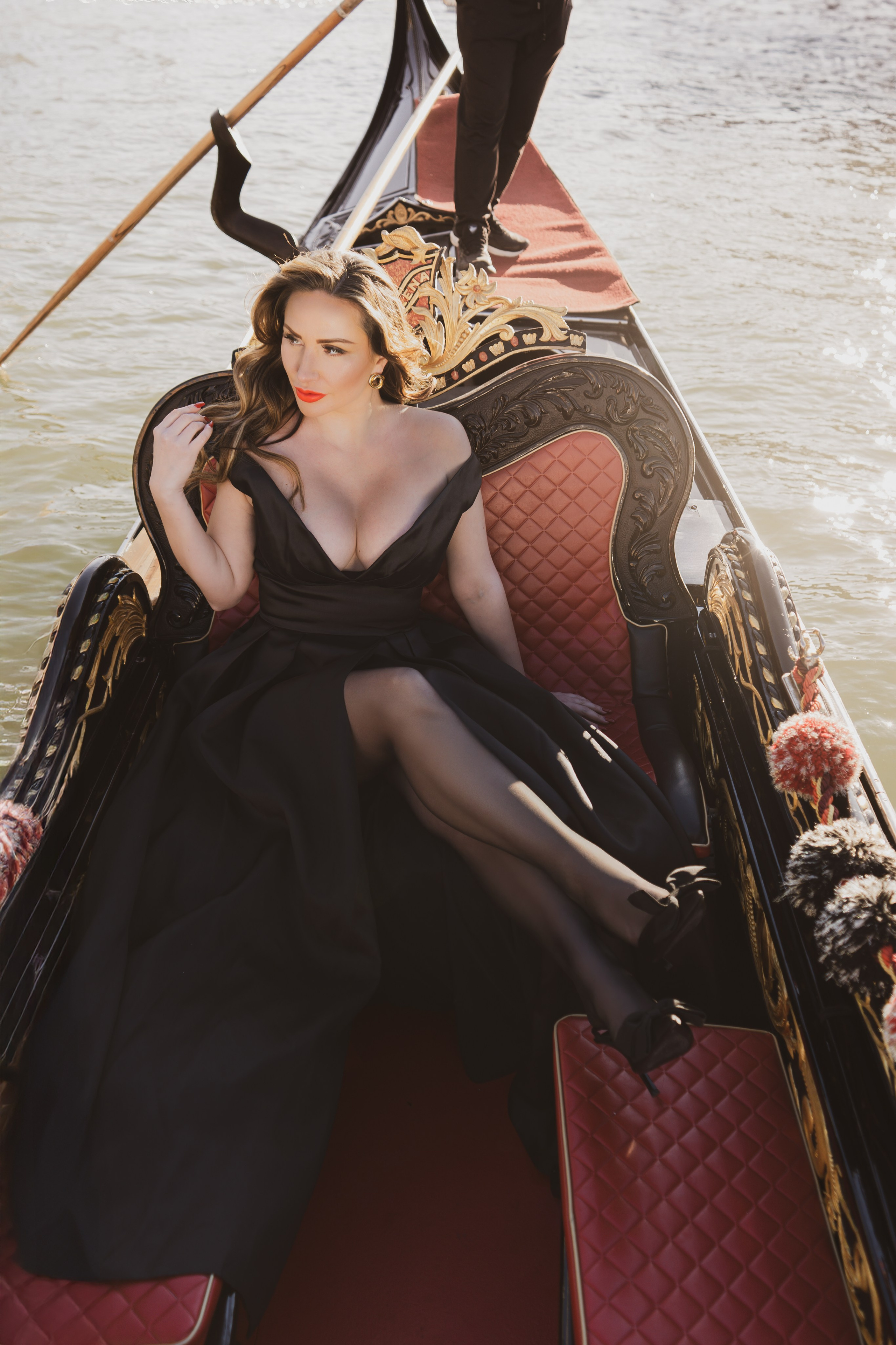  Luxury personal photoshoot in Venice on a private boat with flowing dress.