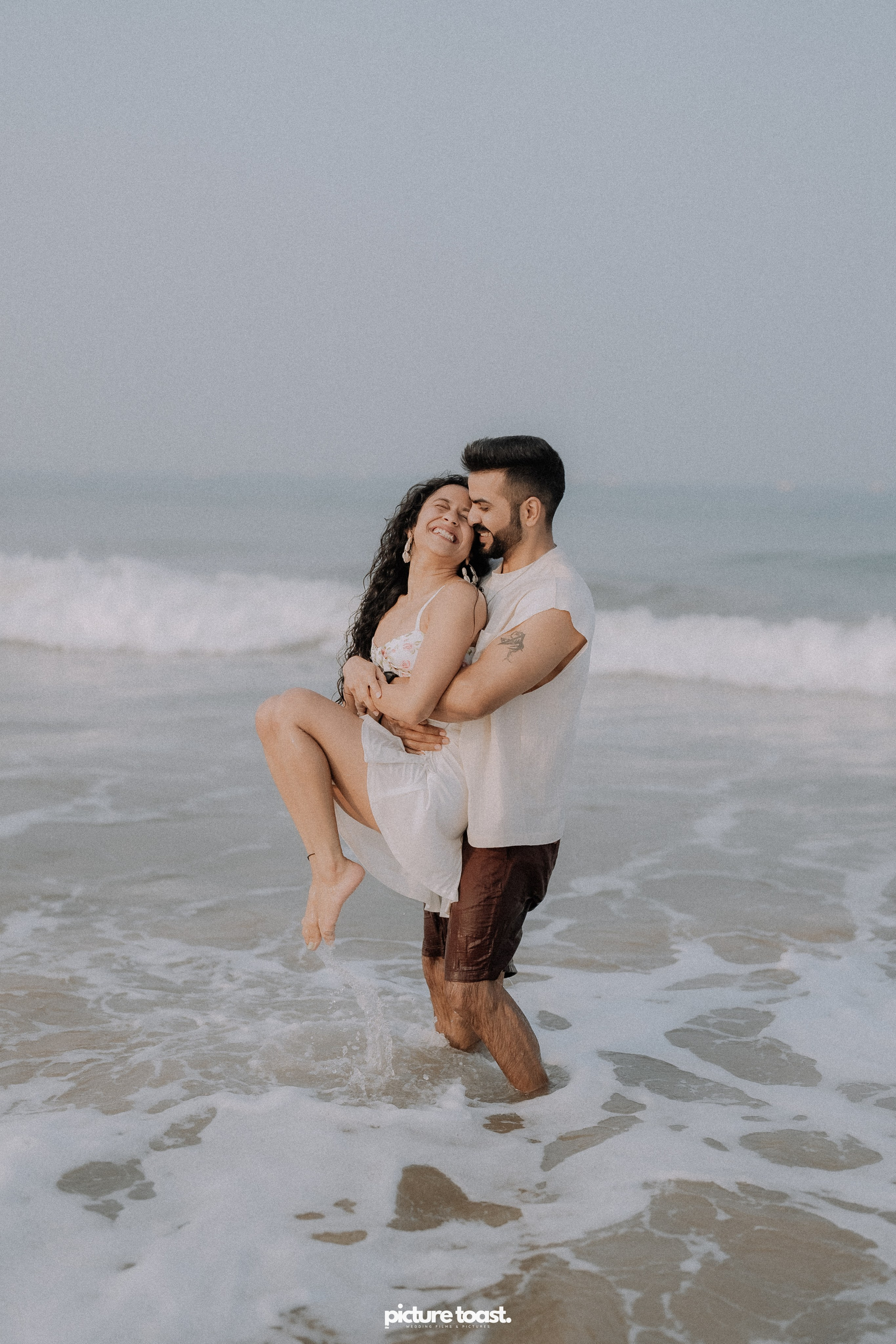 Love In The Beach. Fine art Wedding Photographers in India & Canada