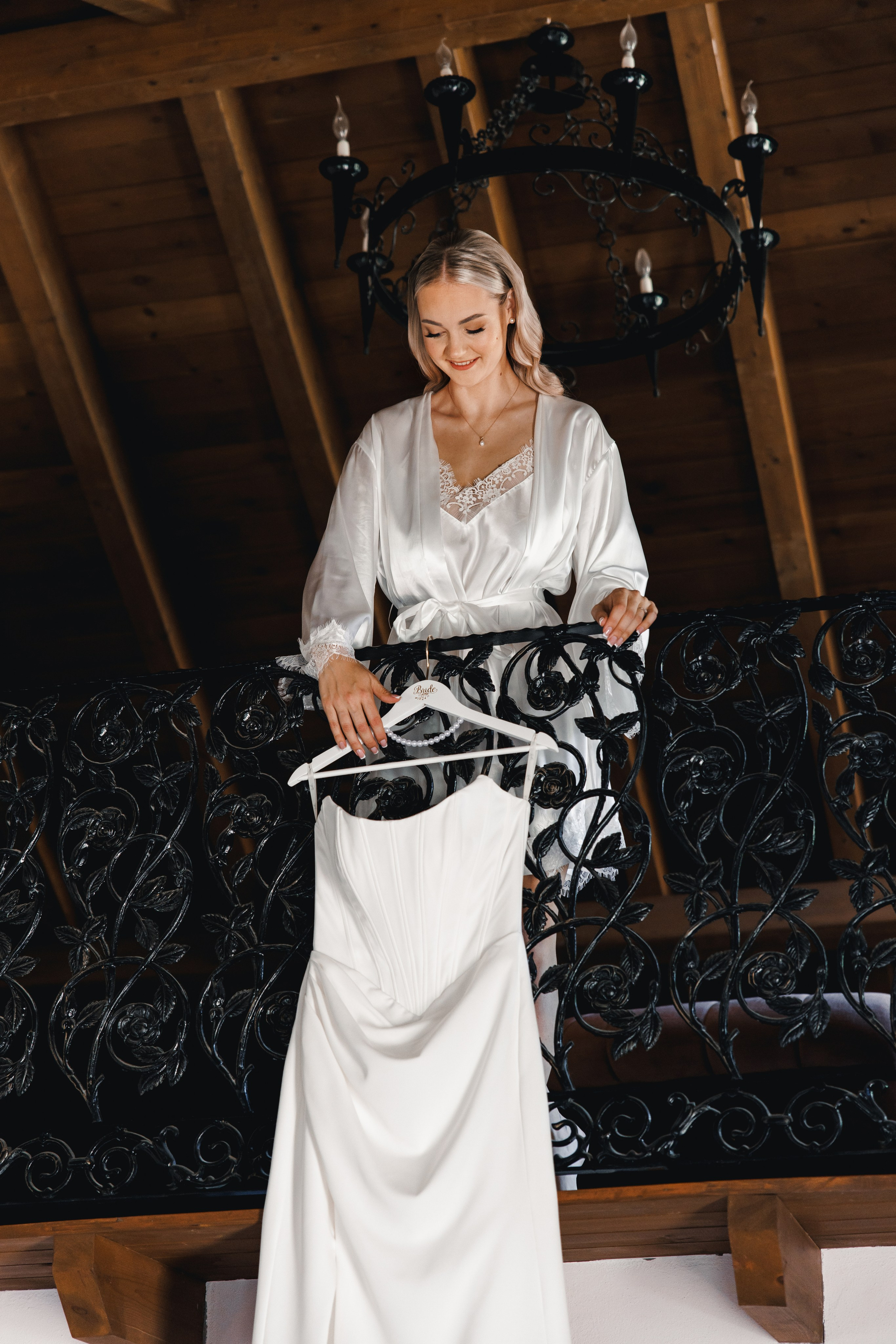 Wedding dress in bride’s hands