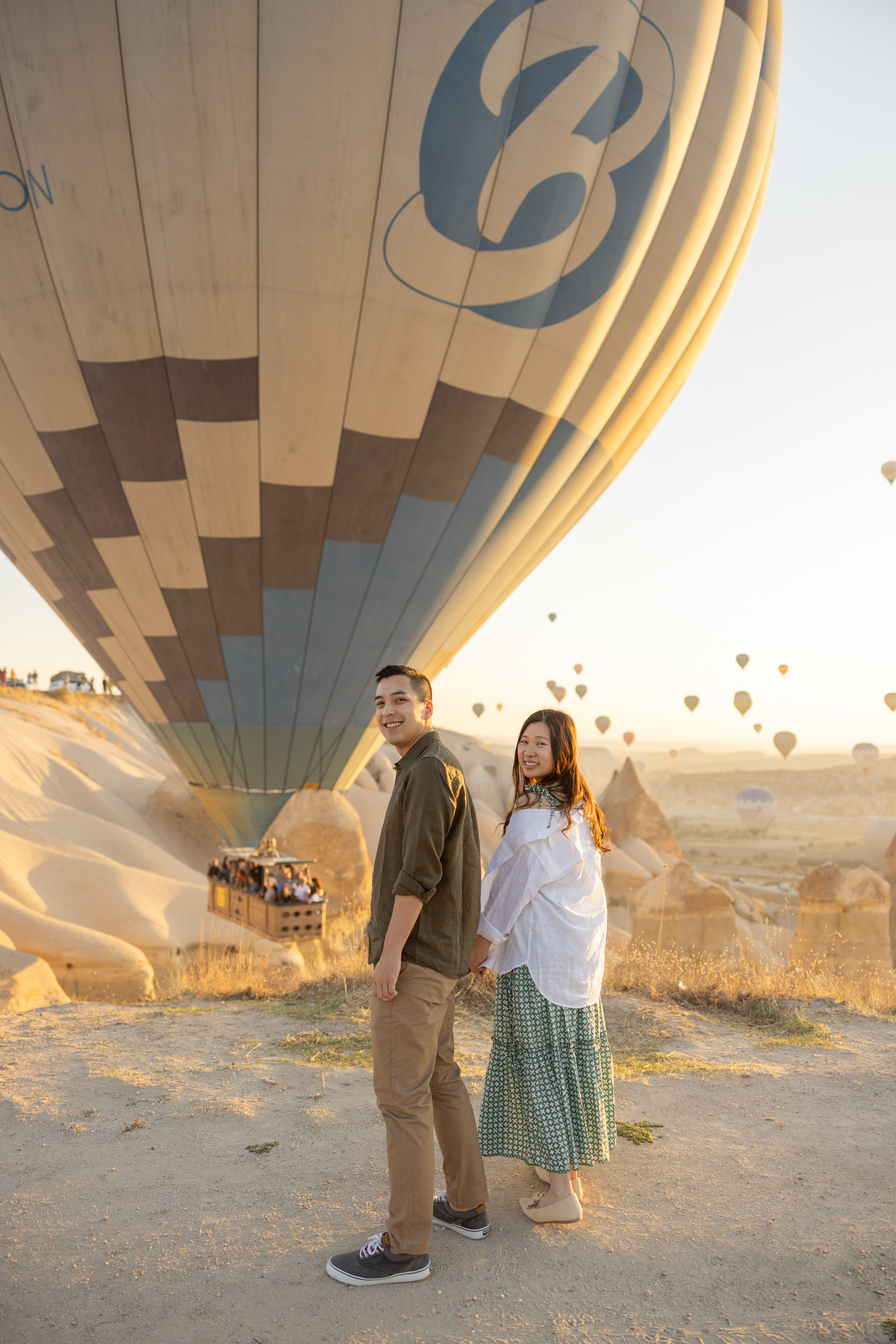 Romantic Love Story Photoshoot with Hot Air Balloons in Cappadocia. Julia Ganch I Fashion Wedding Photography I Cappadocia Turkey