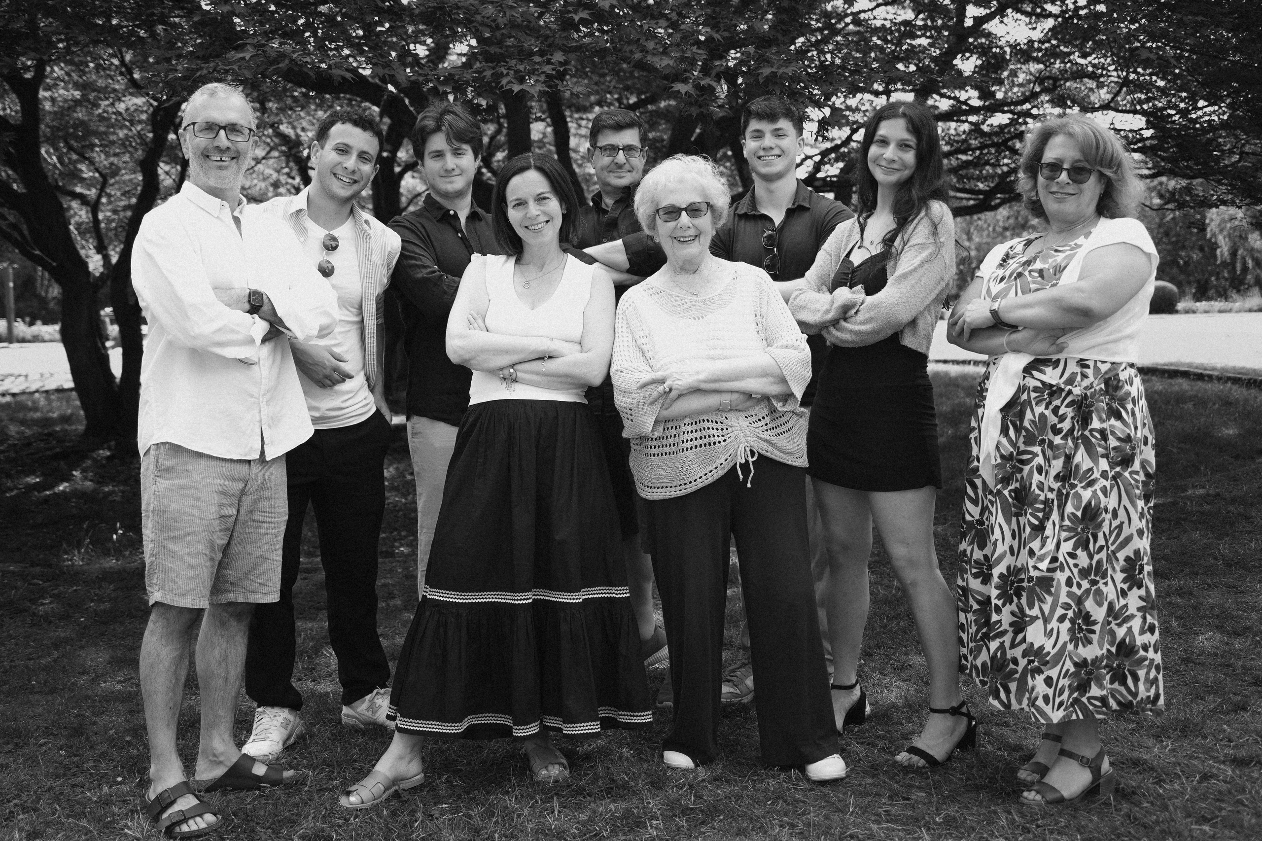 Three-generation family smiling outside in Hampton-in-Arden on grandma’s 90th.