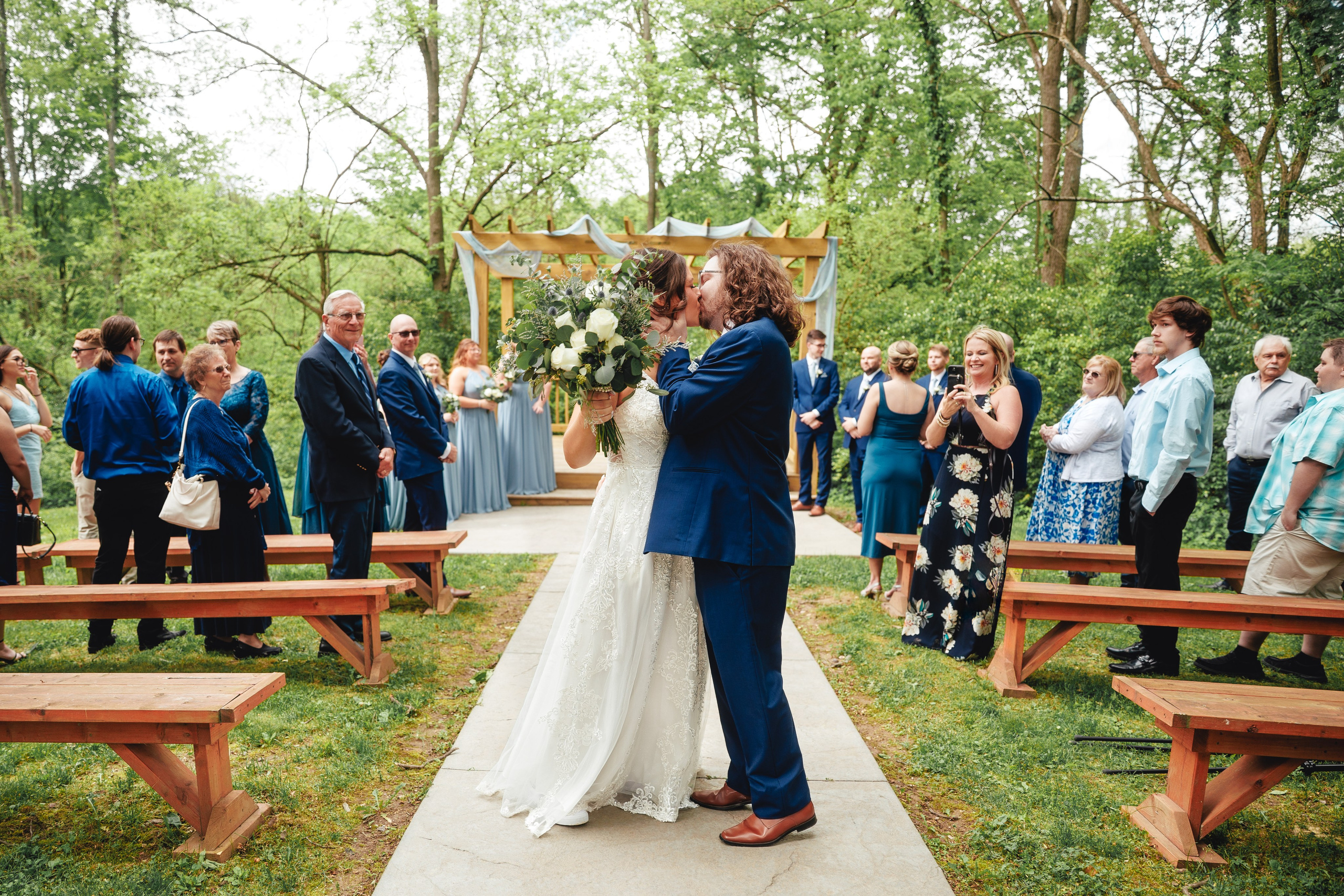 Romantic first kiss wedding ceremony portrait at indianapolis