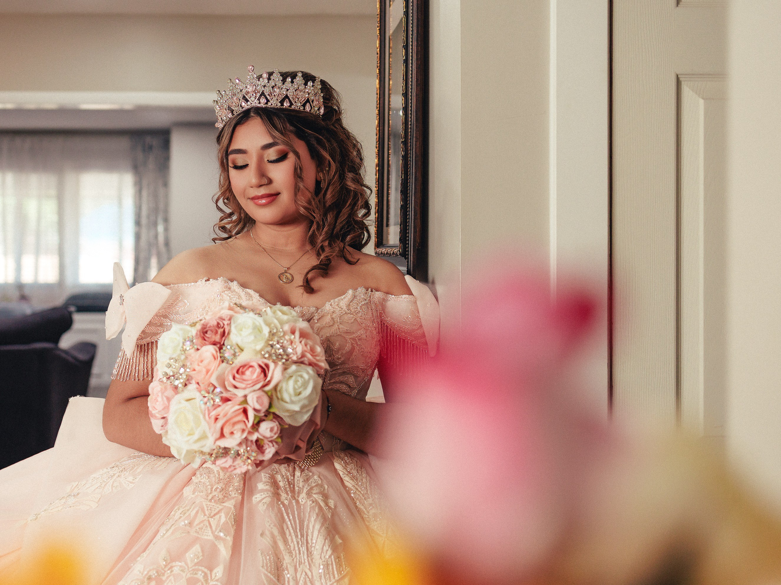 Elegant golden ballgown quinceañera portrait session inside historic estate Indiana