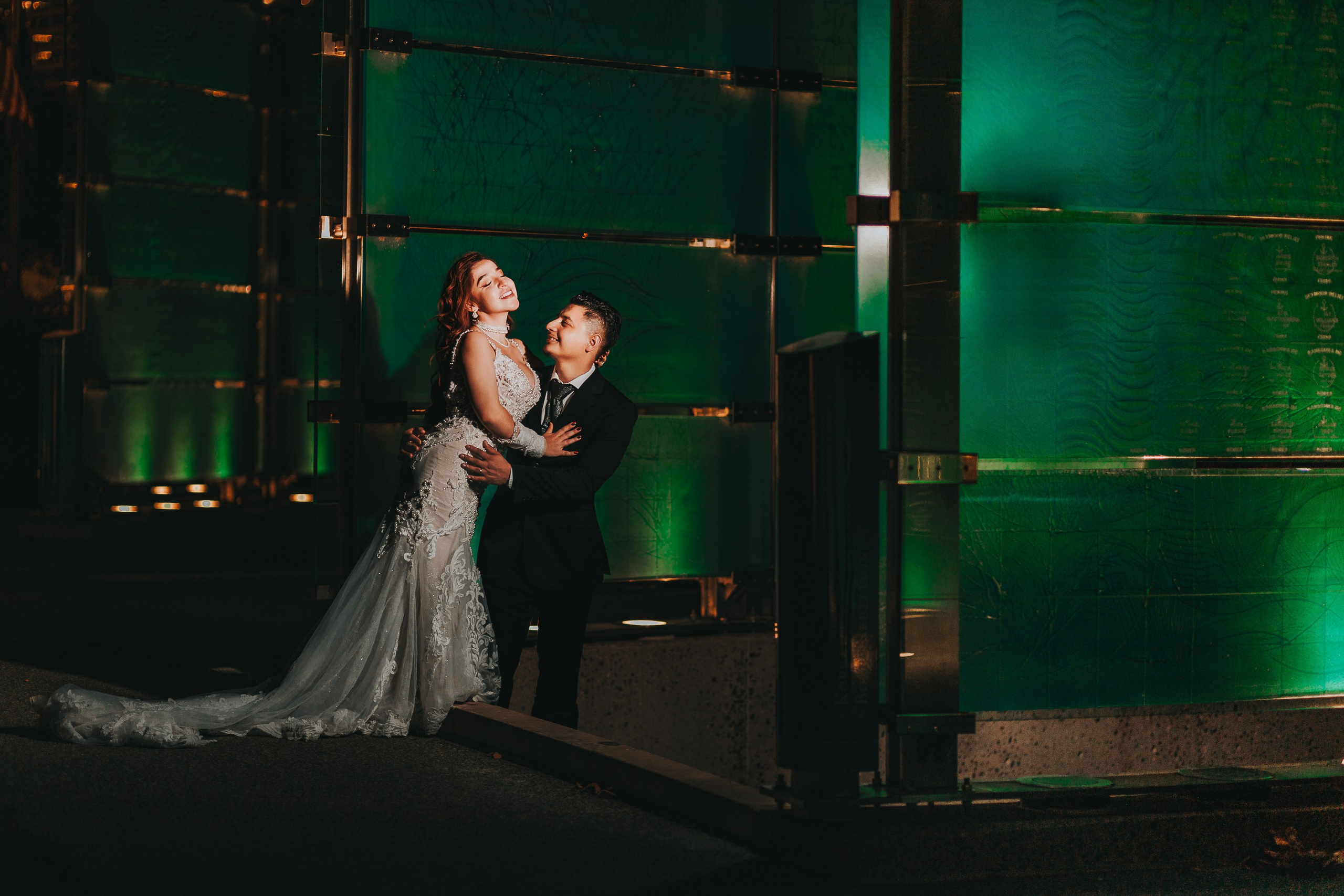 Cinematic evening wedding reception couple portrait with ambient lighting Indianapolis