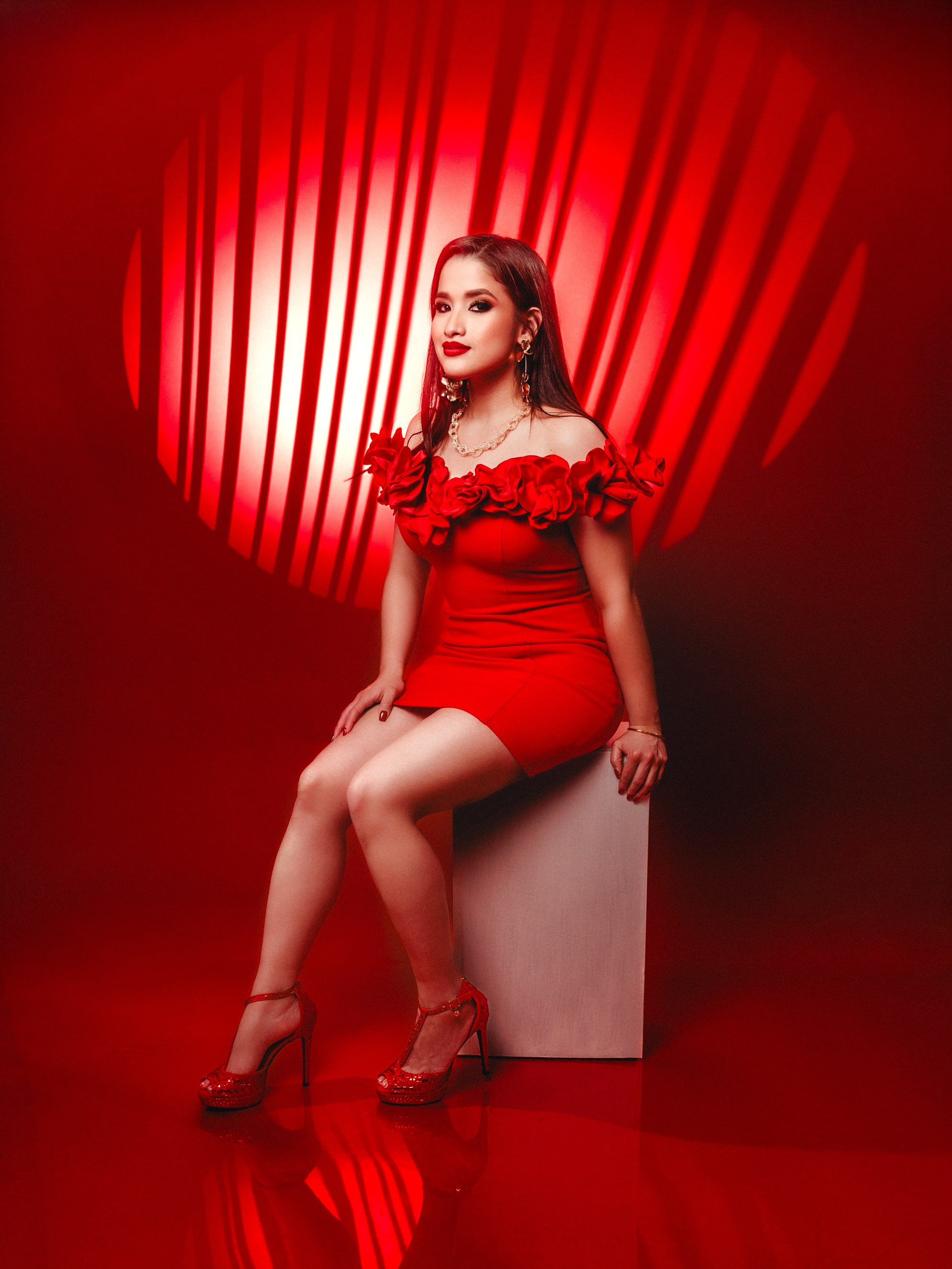 High fashion creative portrait with vertical striped optical snoot light by Gabby Aguirre Photography