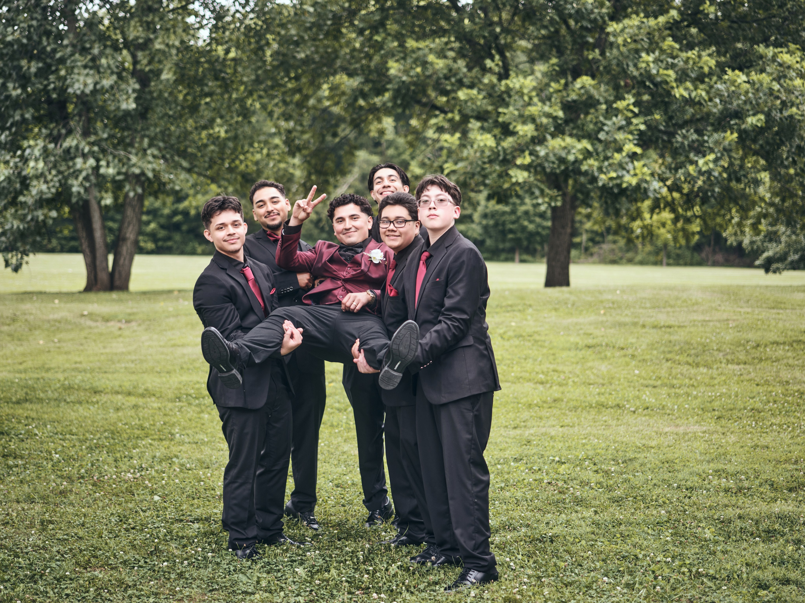 Groom with groomsmen outdoor portrait session at Garfield Park Indianapolis