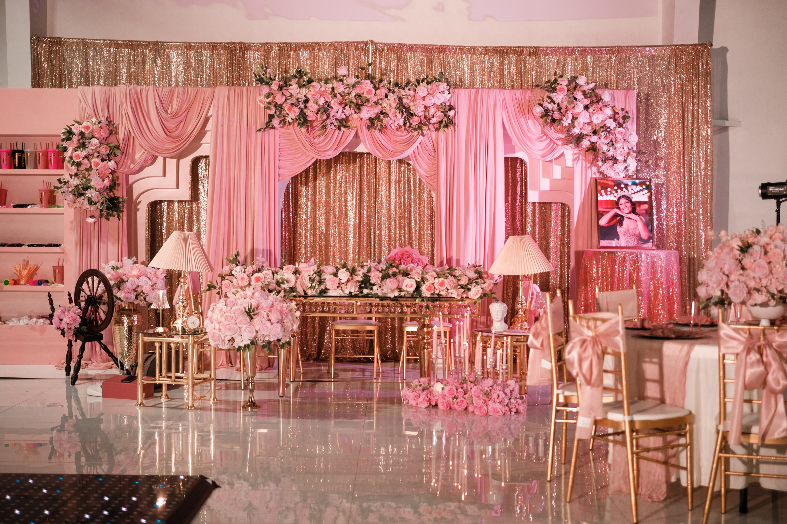 Reception table seating and candlelit room ambiance during the celebration