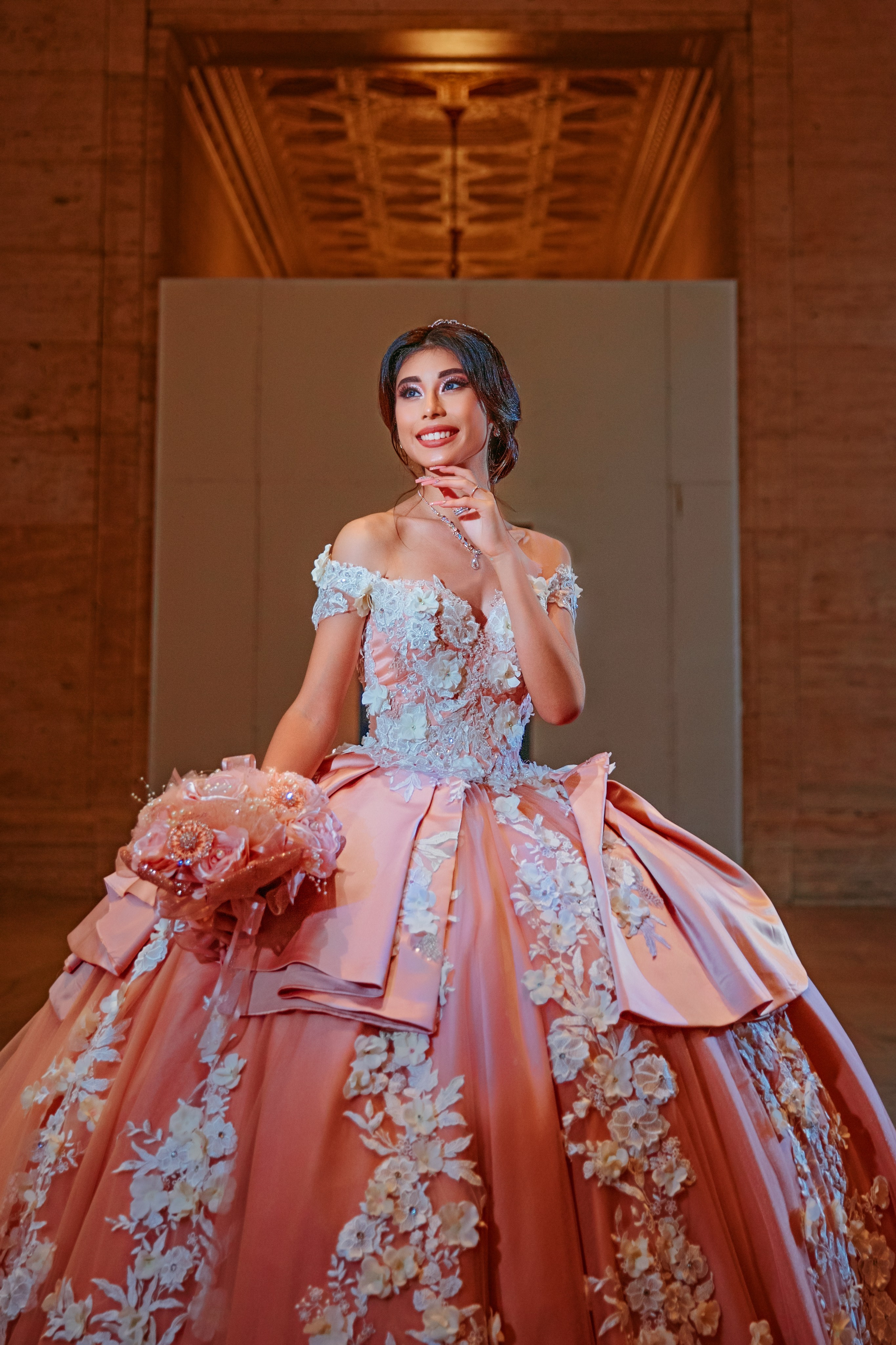 Cinematic fine art quinceanera portrait in grand historic hall