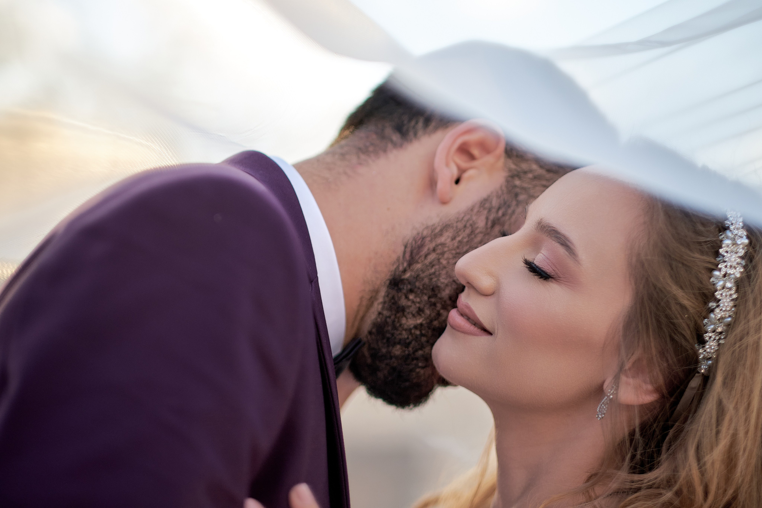 Love Story , wedding Romantic wedding couple portrait, bride with veil and groom in suit, emotional wedding photography by Maxim Polak Israel