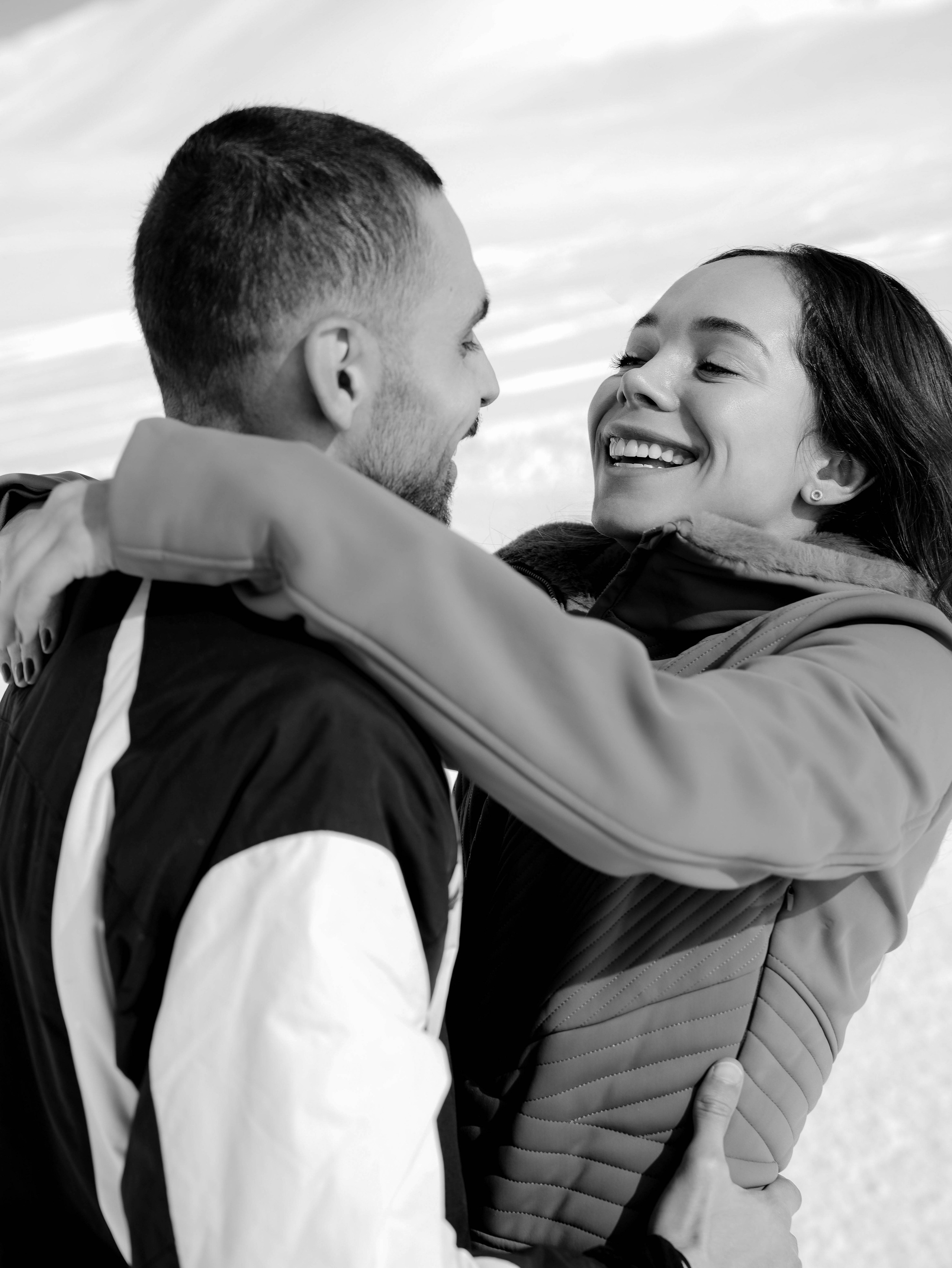 Couple embracing in Gudauri winter mountains