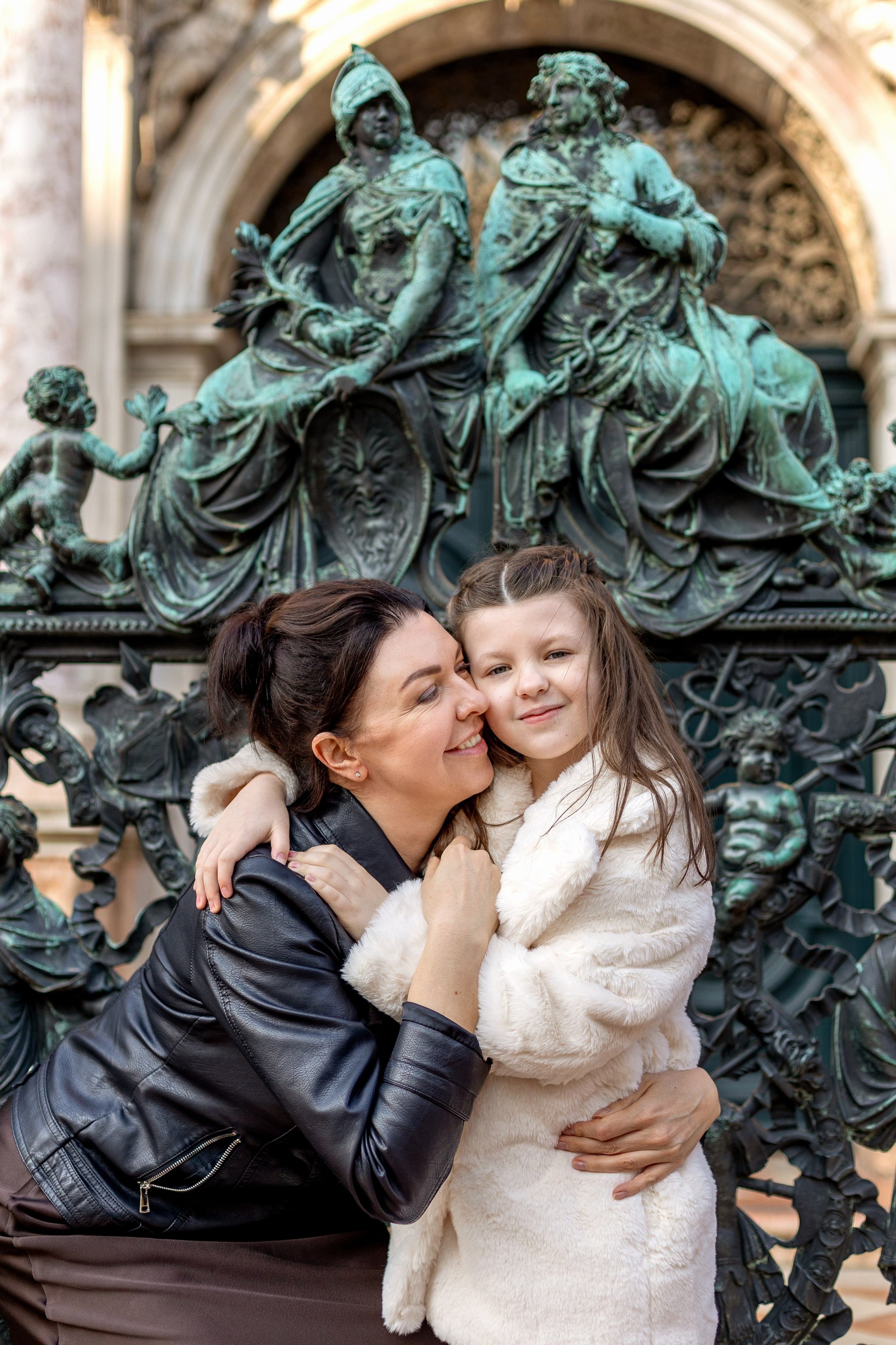 Mother and daughter at sunrise