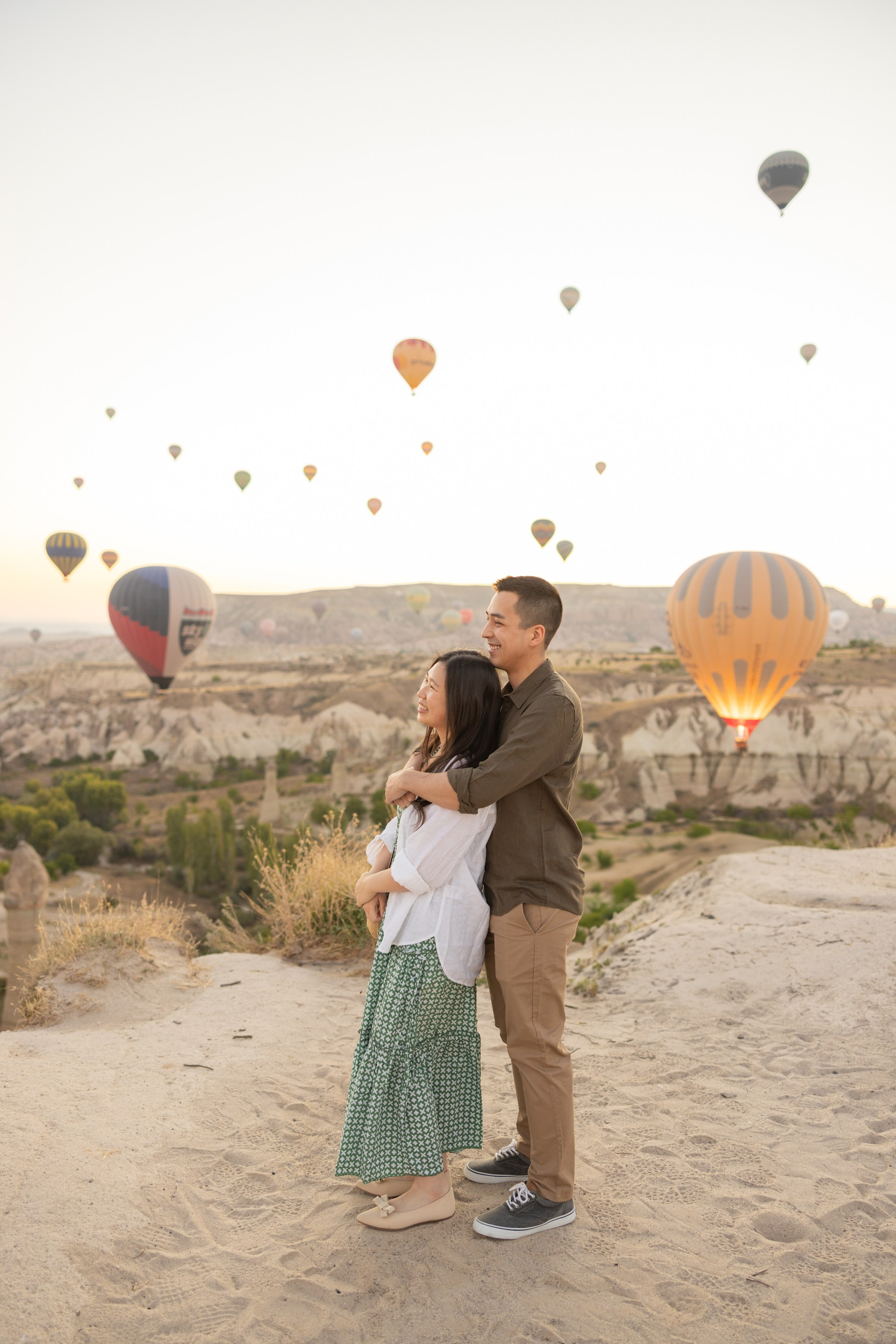 Romantic Love Story Photoshoot with Hot Air Balloons in Cappadocia. Julia Ganch I Fashion Wedding Photography I Cappadocia Turkey