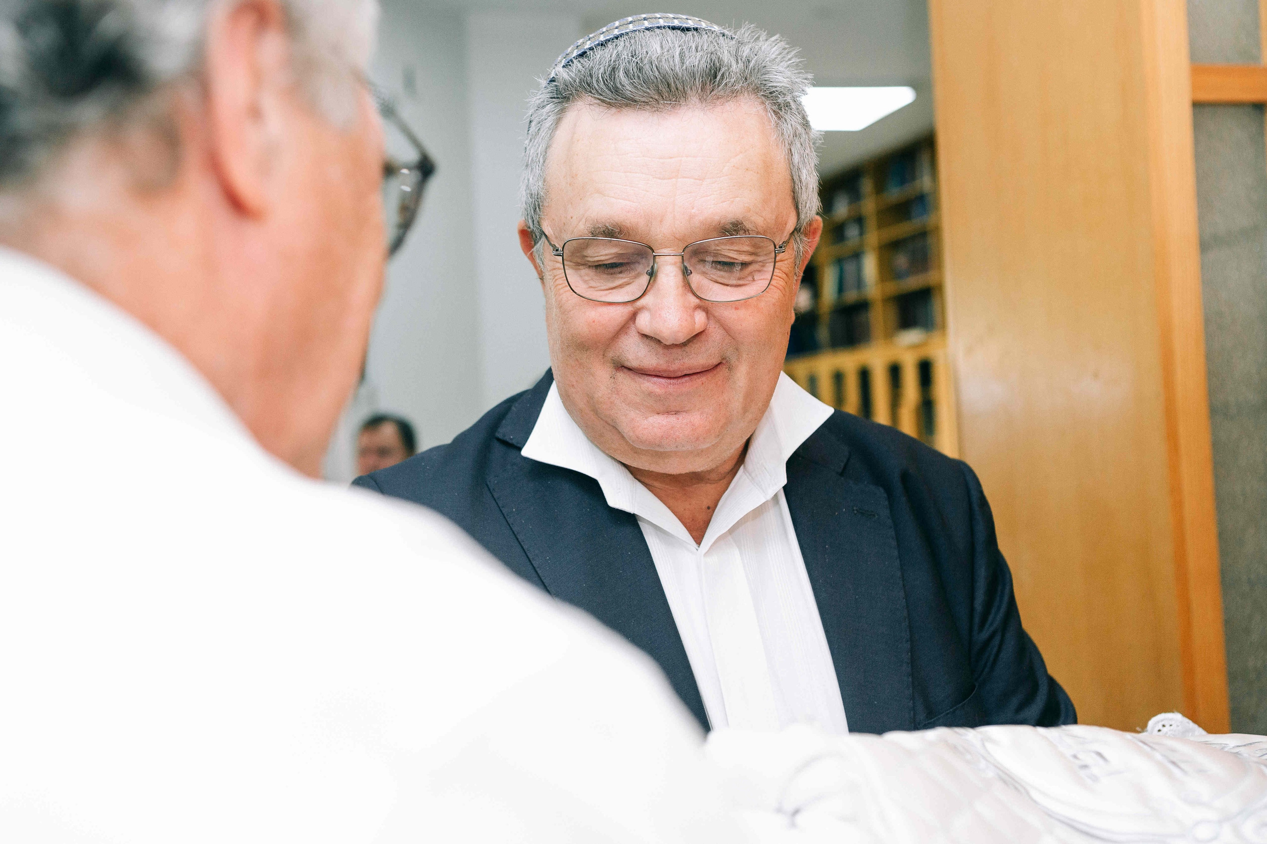 BRITH MILA IN THE SMALL SYNAGOGUE. PHOTOGRAPHER IN ISRAEL