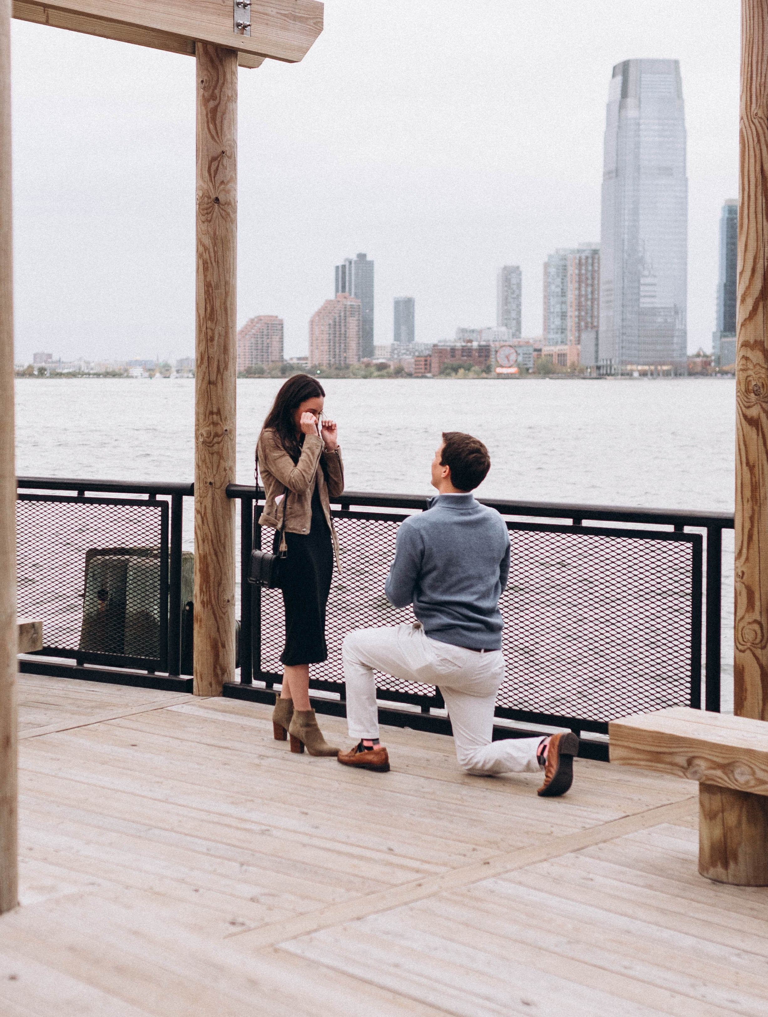 Proposal at Manhattan Bridge park in springtime.