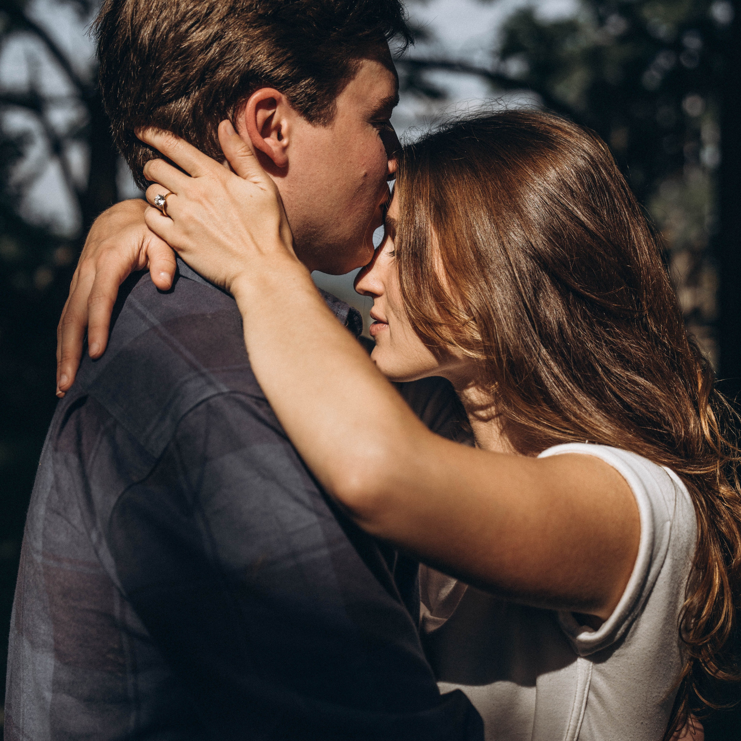 Soft natural light portrait of the future burden and groom in Syracuse New York