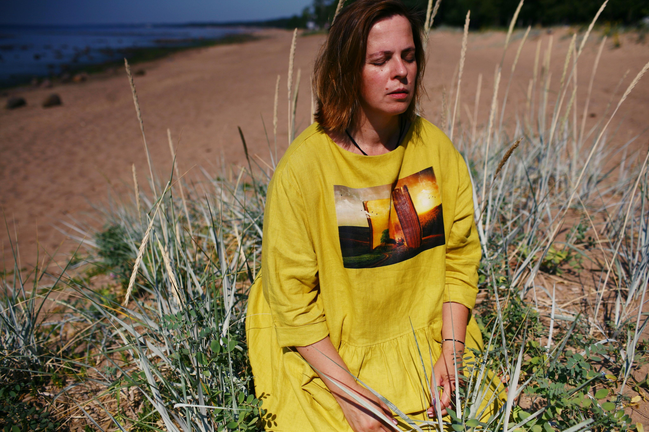 Anna, by herself. Stones and sand. Victoria Dini. Art photography in London / Folkestone, UK