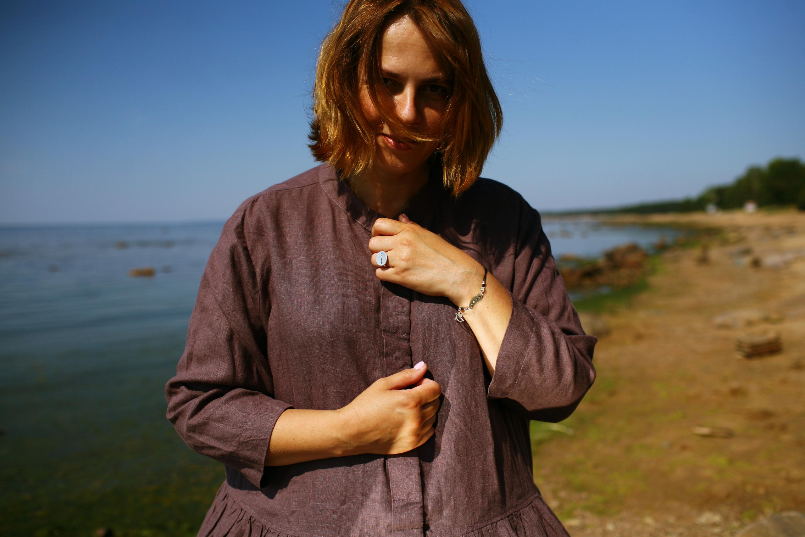 Anna, by herself. Stones and sand. Victoria Dini. Art photography in London / Folkestone, UK