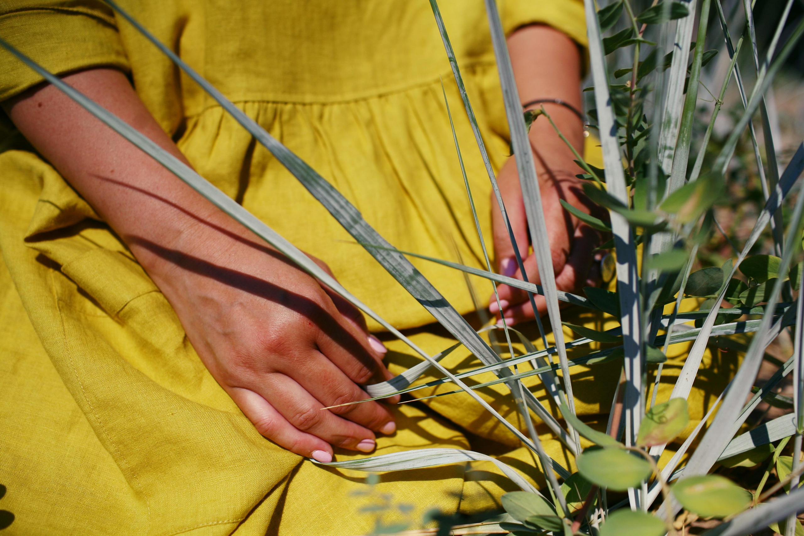 Anna, by herself. Stones and sand. Victoria Dini. Art photography in London / Folkestone, UK