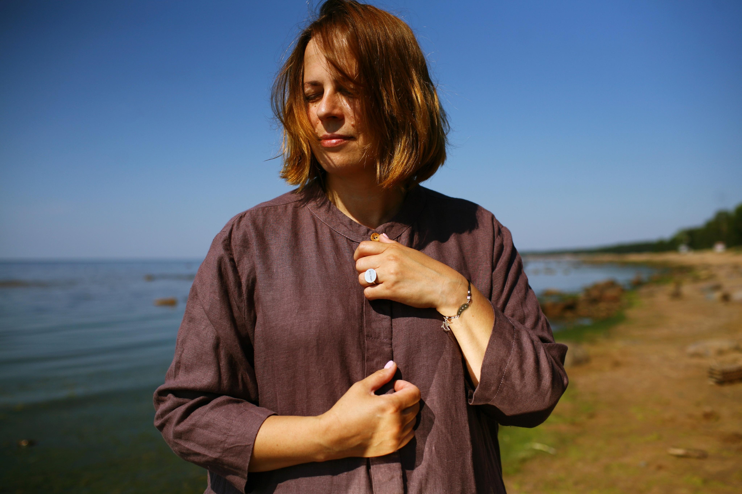Anna, by herself. Stones and sand. Victoria Dini. Art photography in London / Folkestone, UK