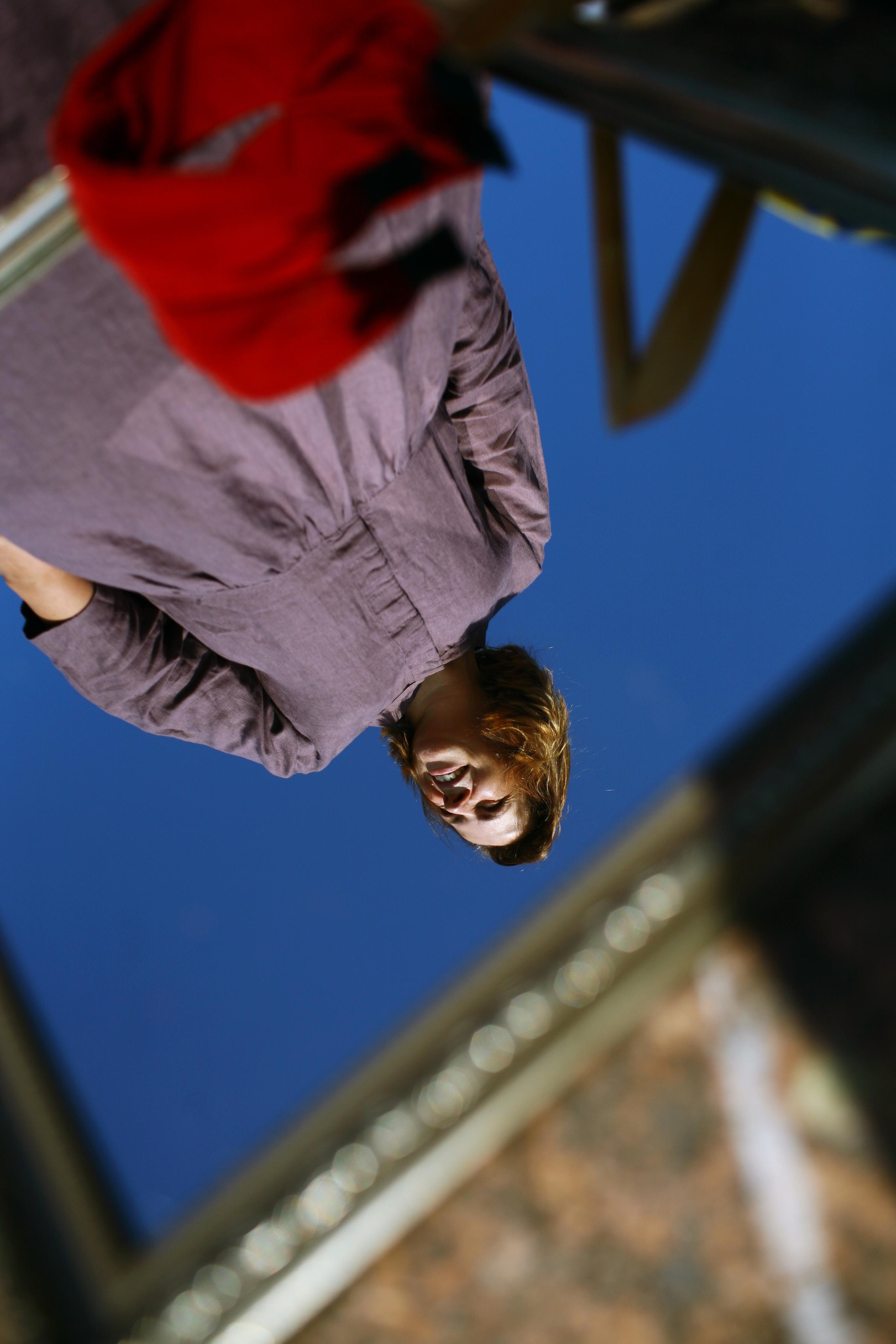 Anna, by herself. Stones and sand. Victoria Dini. Art photography in London / Folkestone, UK