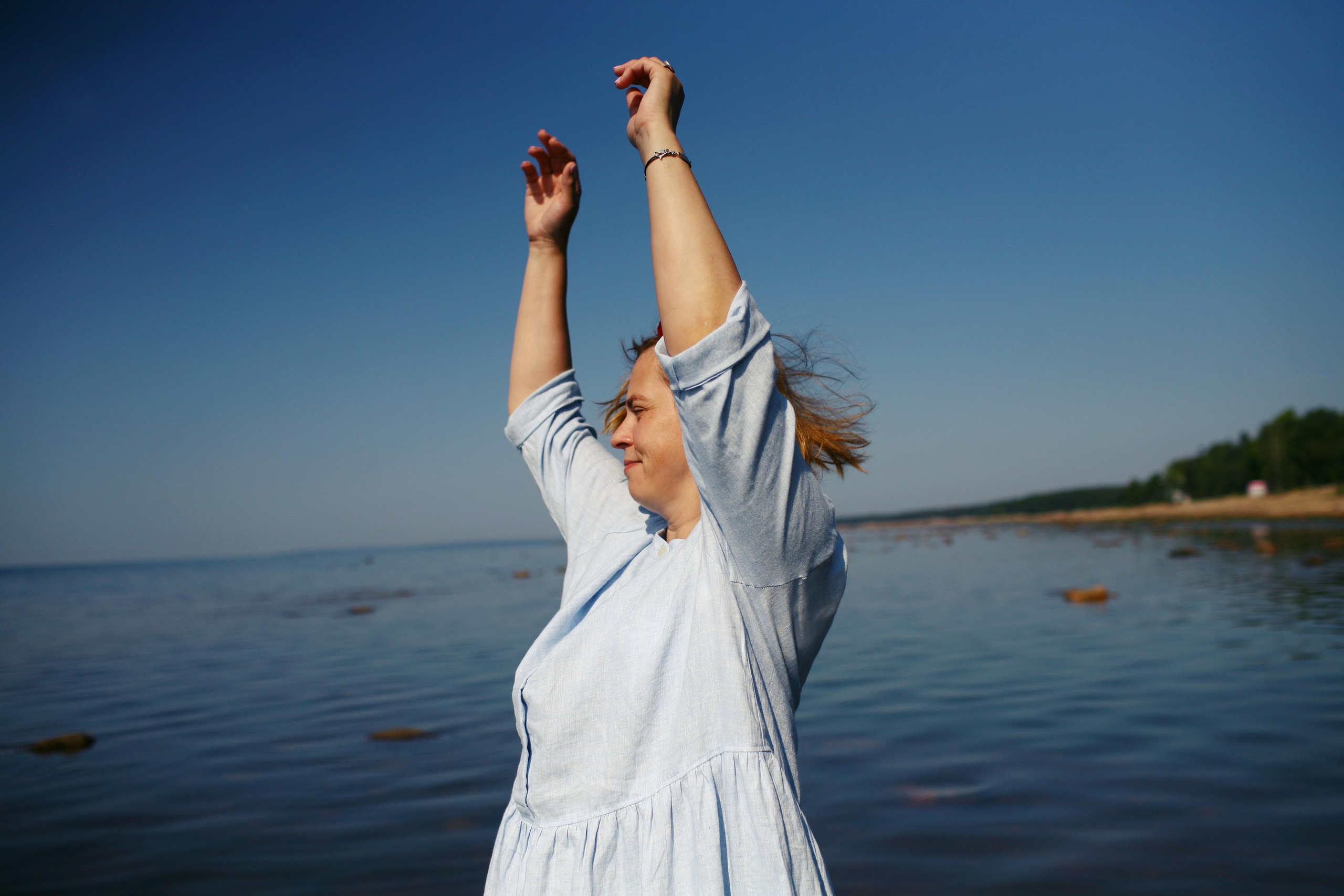 Anna, by herself. Stones and sand. Victoria Dini. Art photography in London / Folkestone, UK
