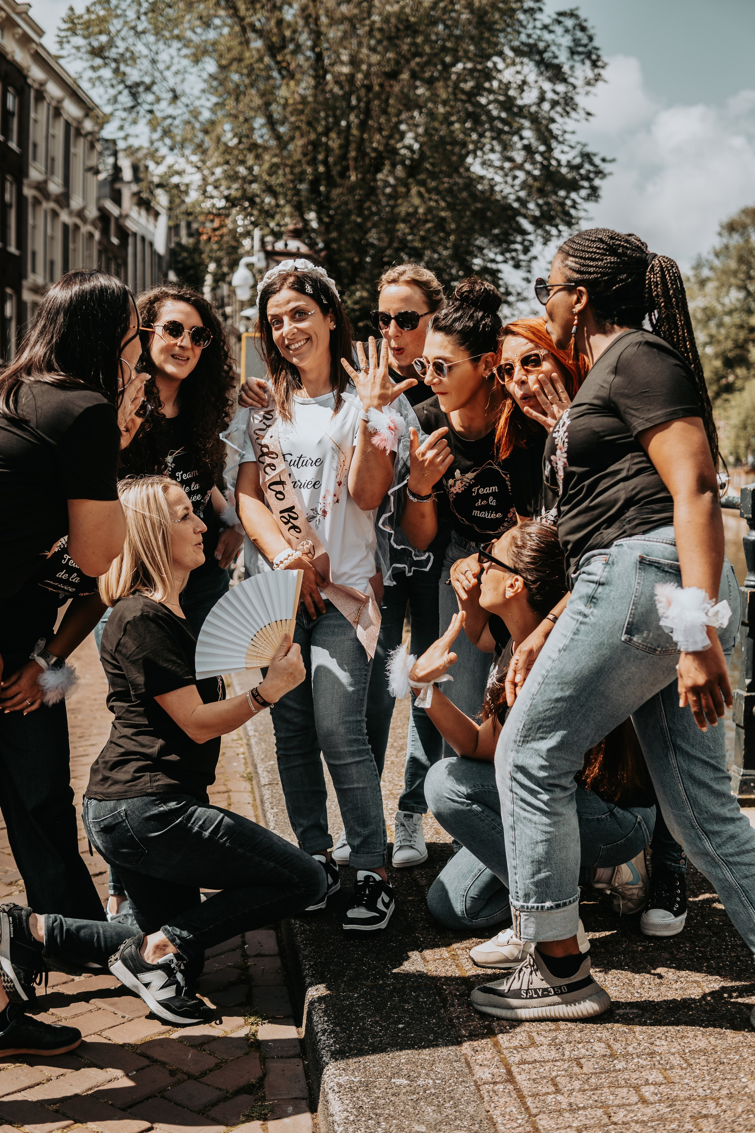 Girls surrounding the bride to be for a bachelortte party