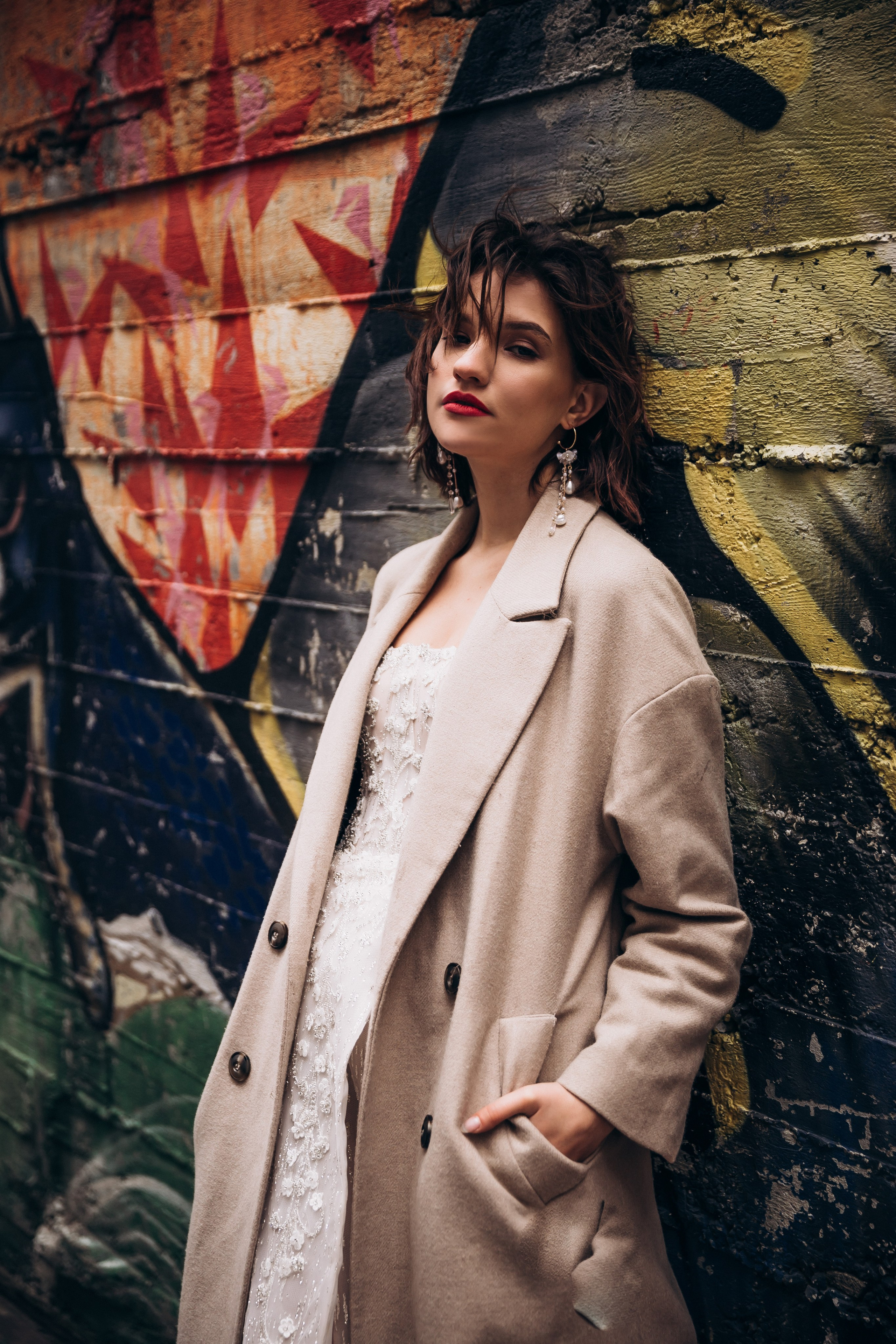 Bride and groom walking through Istanbul market square, timeless wedding photography Europe.