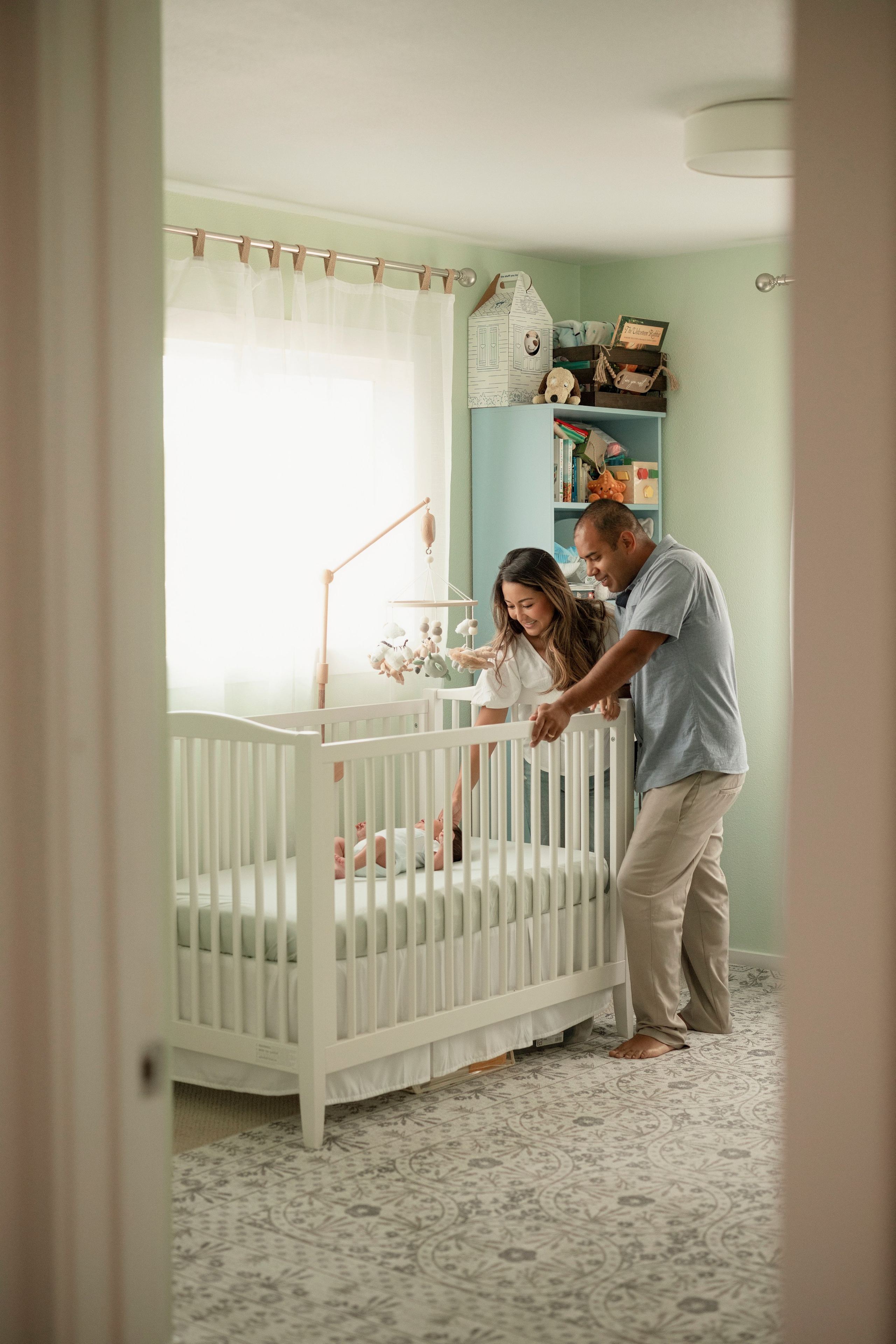 Cozy family photography session with newborn baby and parents