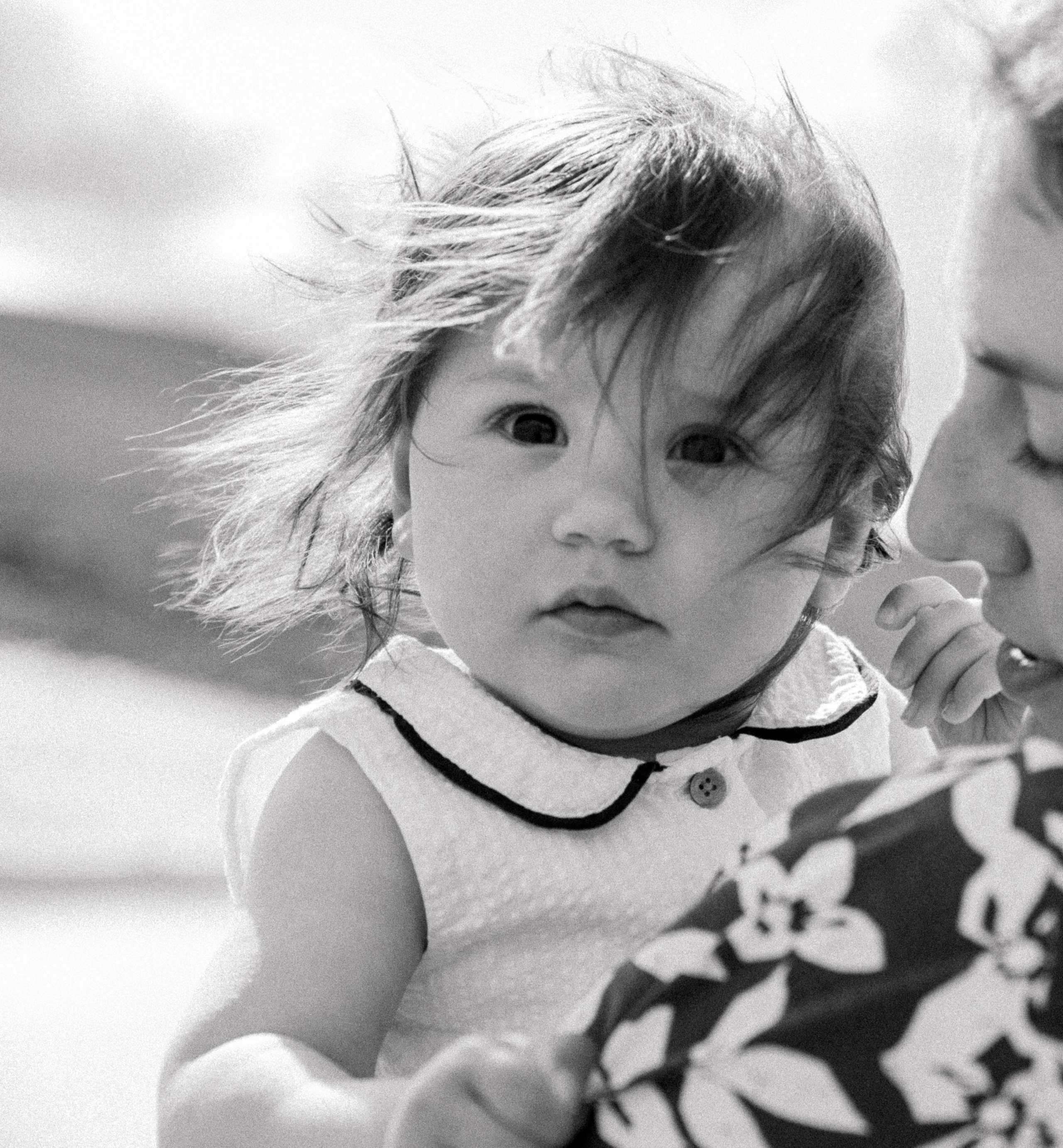 Darya and Mia at the ocean. Wedding and family photographer Ireland