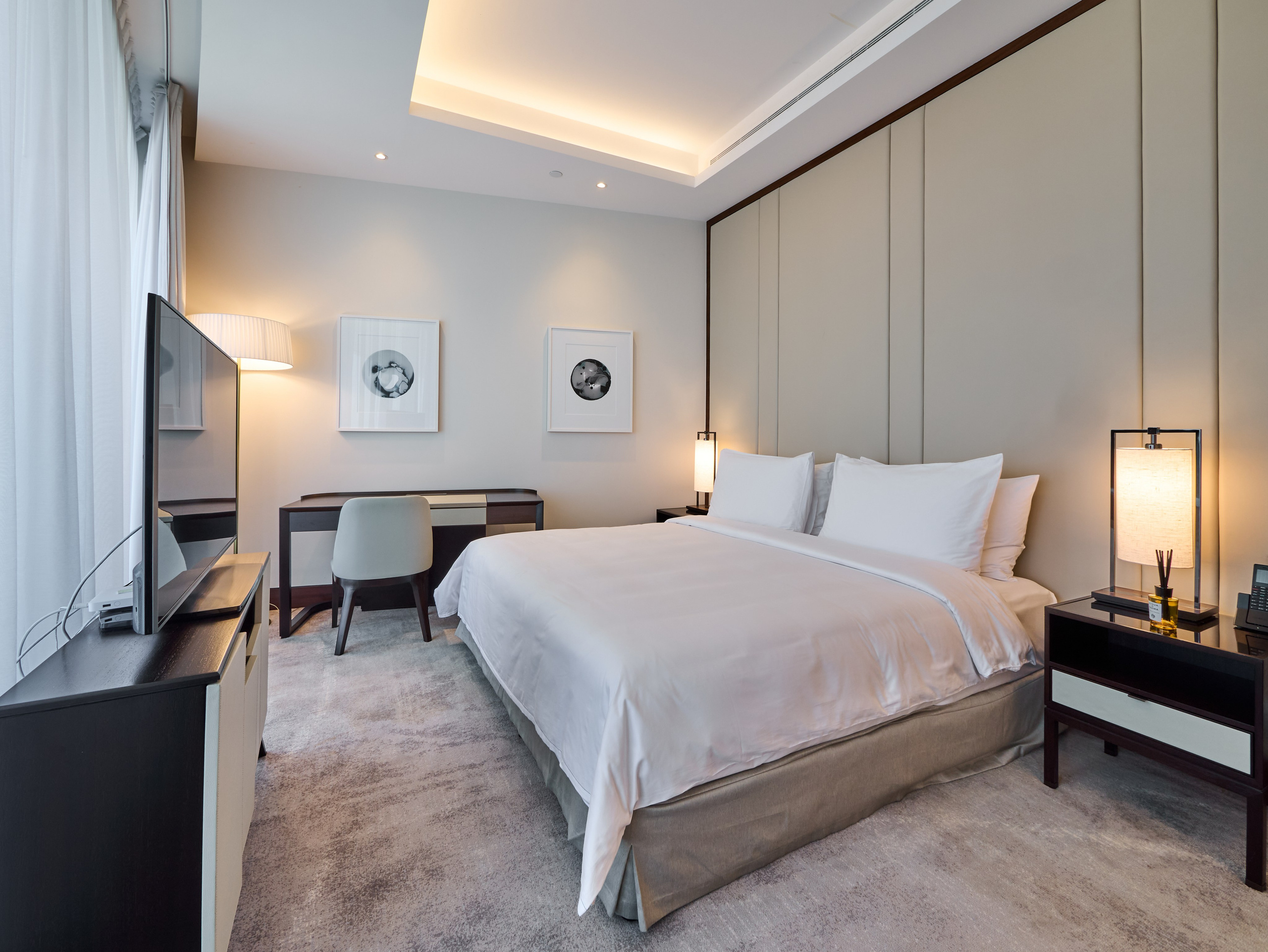 Contemporary bedroom interior in Address Sky View hotel near Burj Khalifa, ideal for Airbnb and Booking. Shot by Dubai real estate photographer Oleg Novikov.