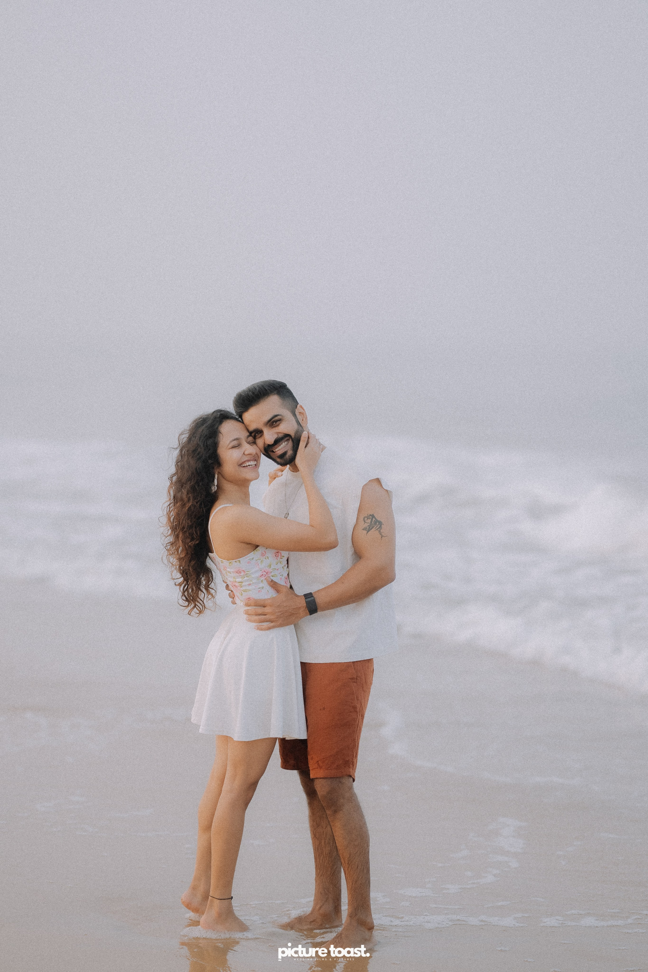 Love In The Beach. Fine art Wedding Photographers in India & Canada