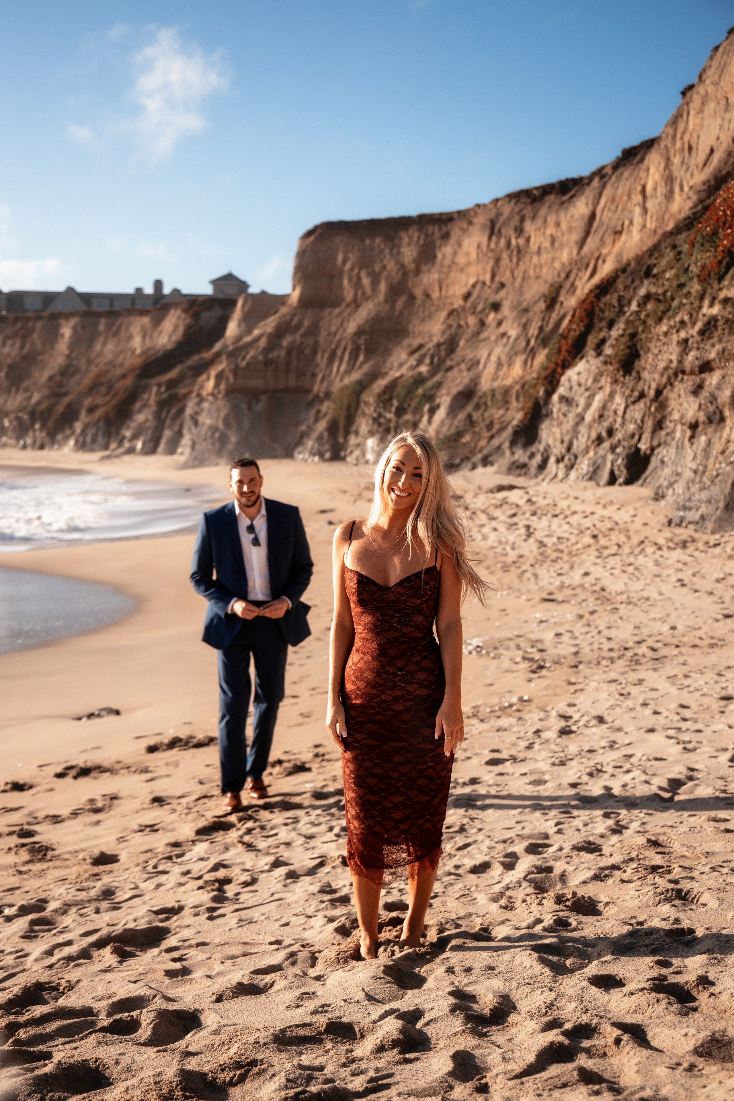 Groom proposing at a lookout point with a view of the Bay Area