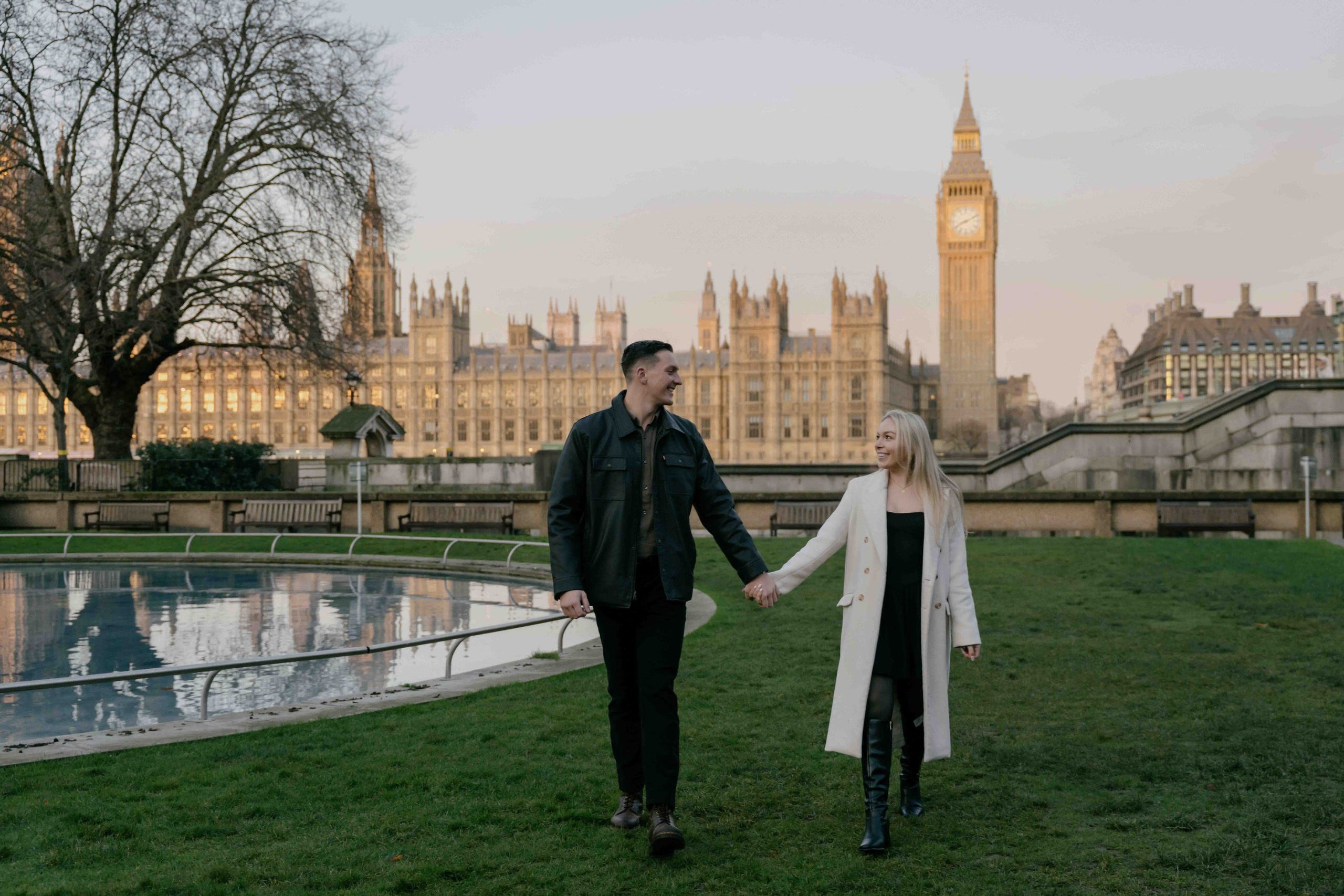 Couple walking in Westminster London early morning before proposal, candid shot