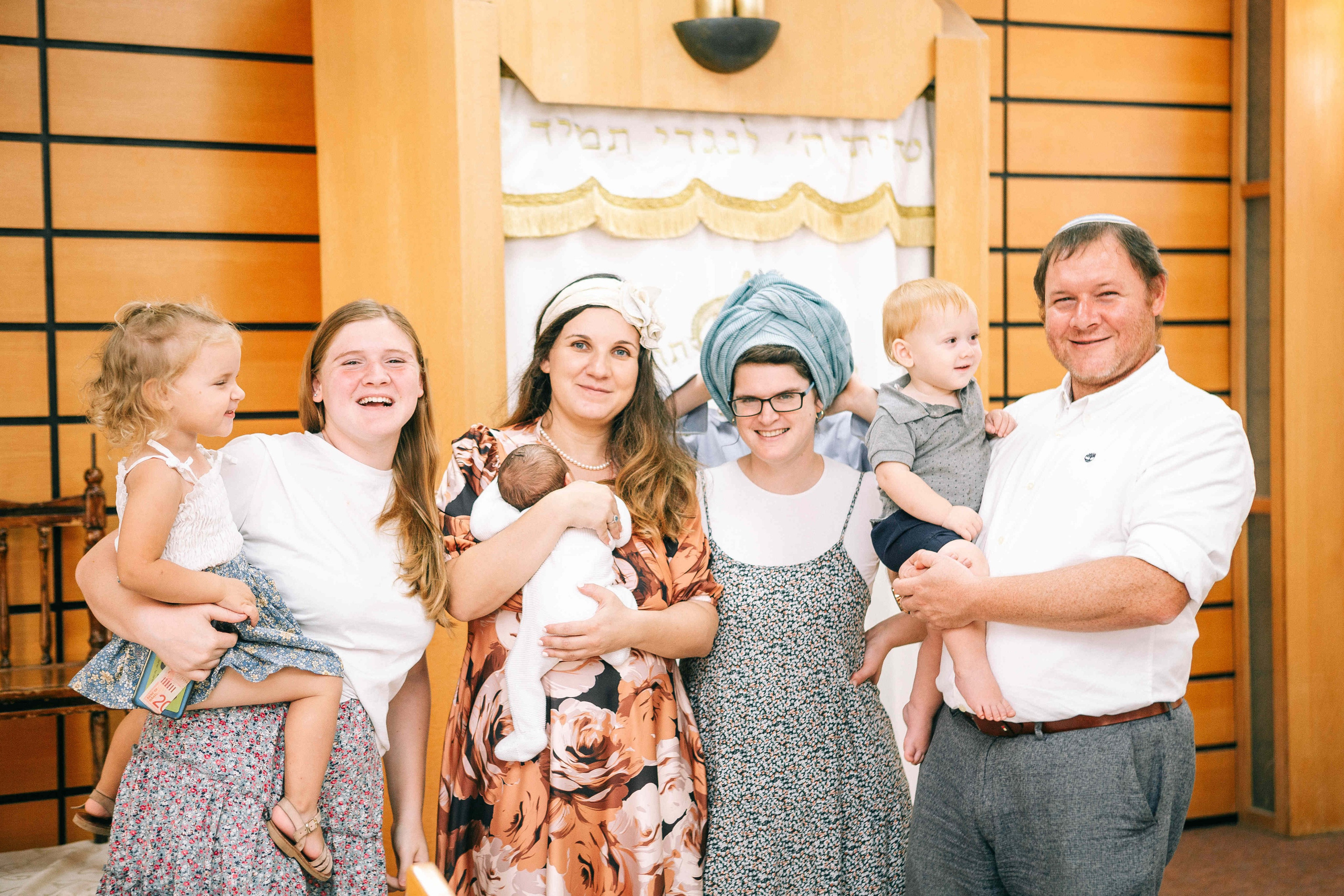 BRITH MILA IN THE SMALL SYNAGOGUE. PHOTOGRAPHER IN ISRAEL