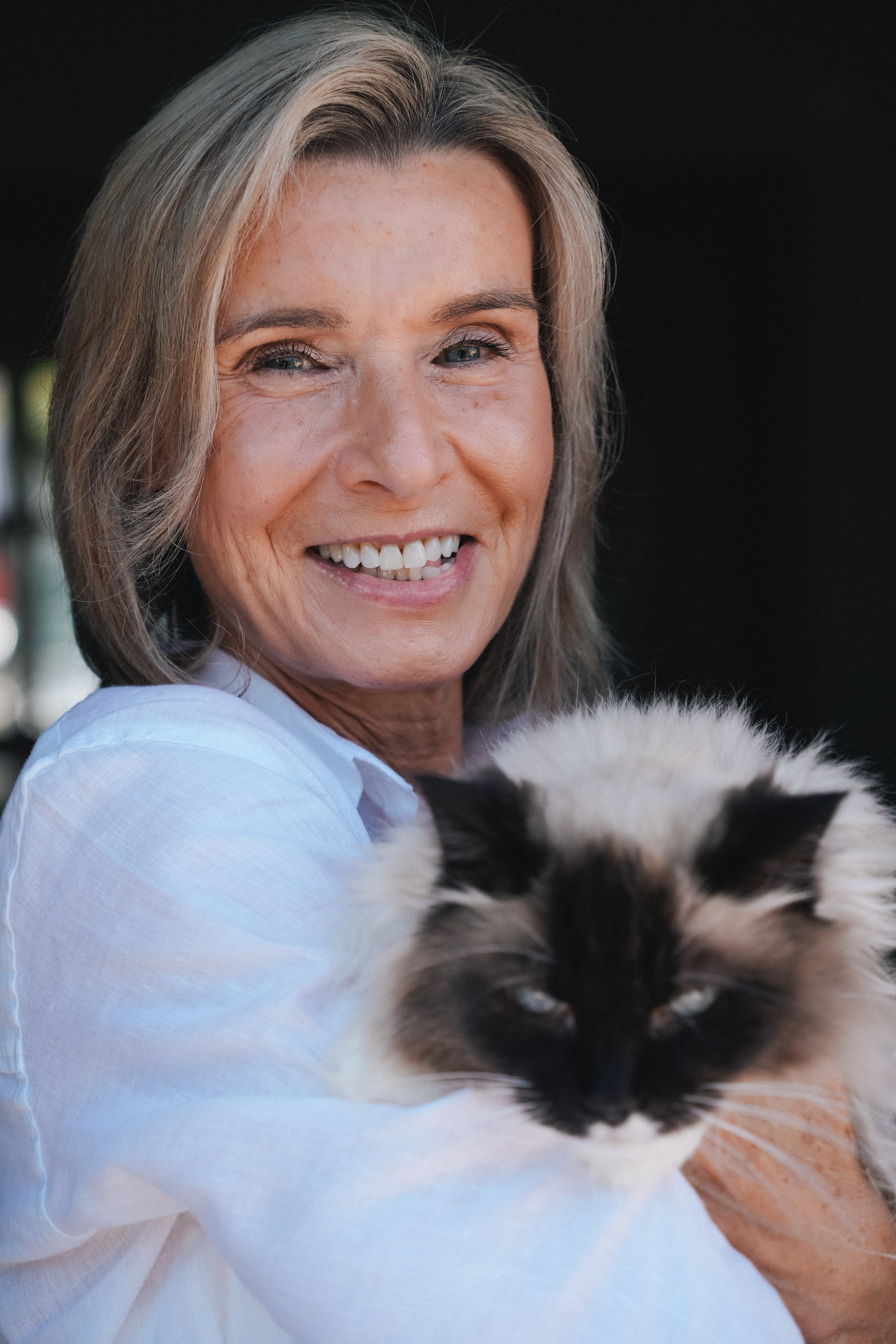 Natural family photography including pet cat, cosy at-home portraits Solihull.