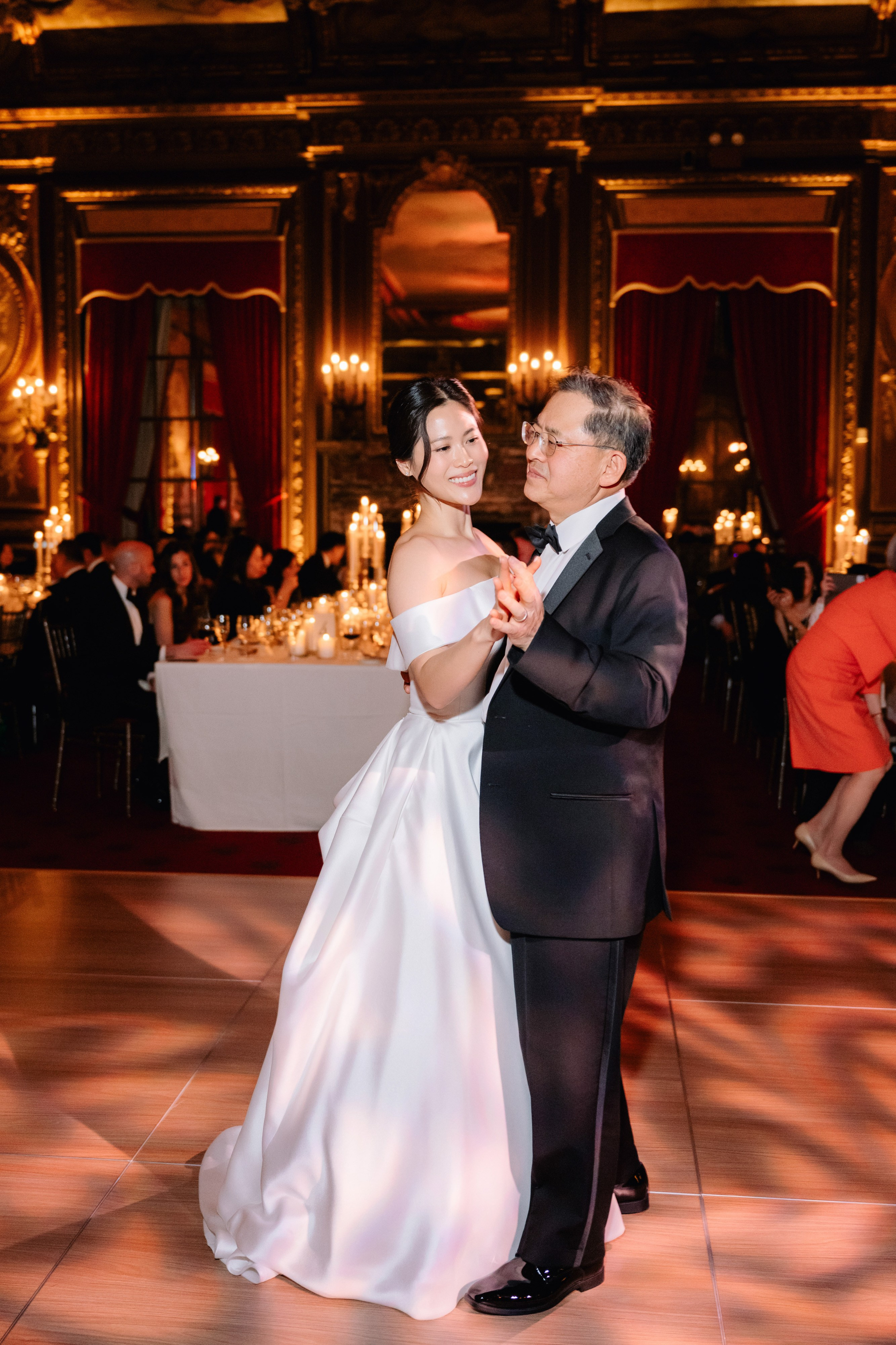 a bride and groom dancing at their wedding reception