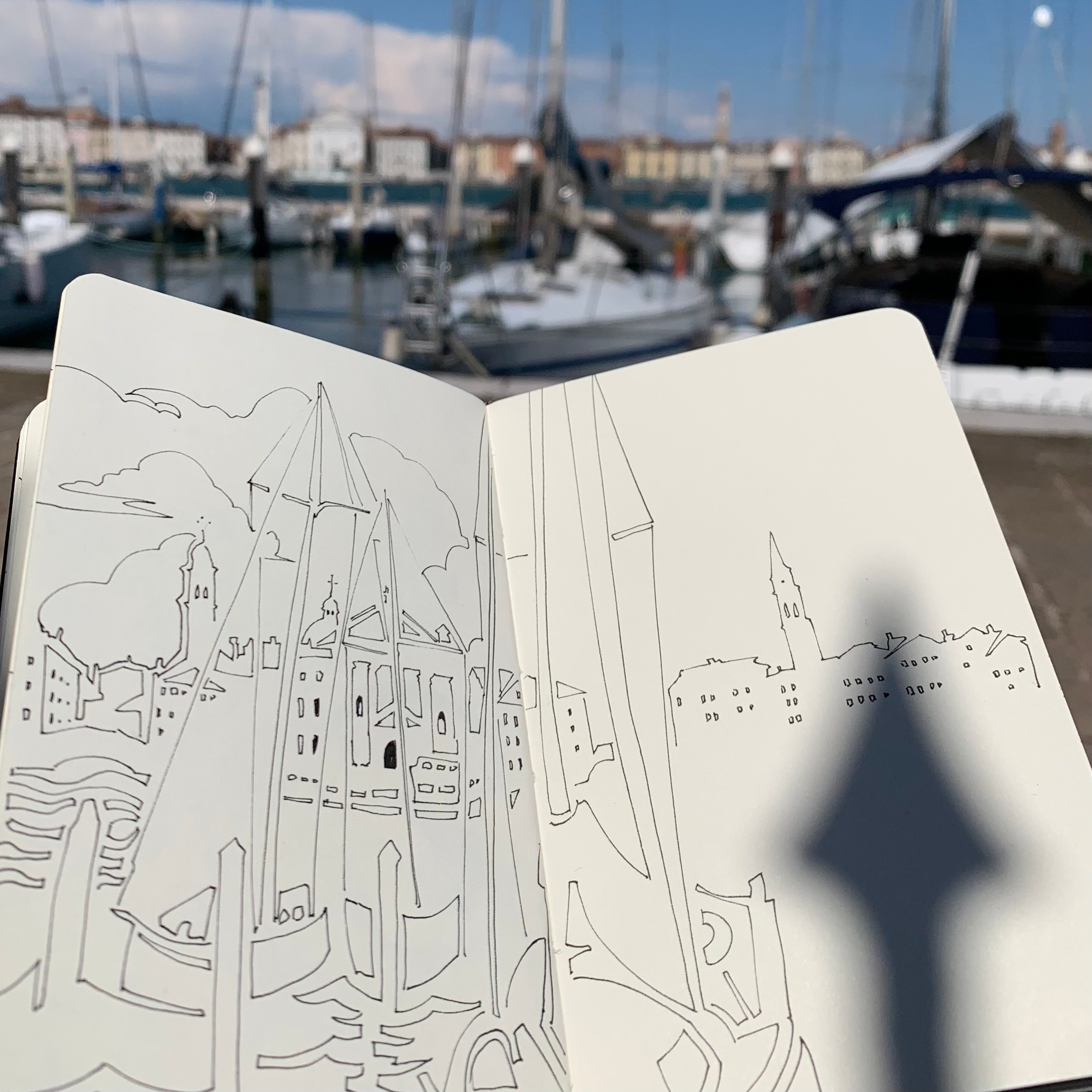 Moleskine notebook with hand-drawn sketches made in Venice, reflecting Nadia Kuprina’s daily drawing practice rooted in observation and visual research. A photo of a drawing of blatta in a Venetian harbor.